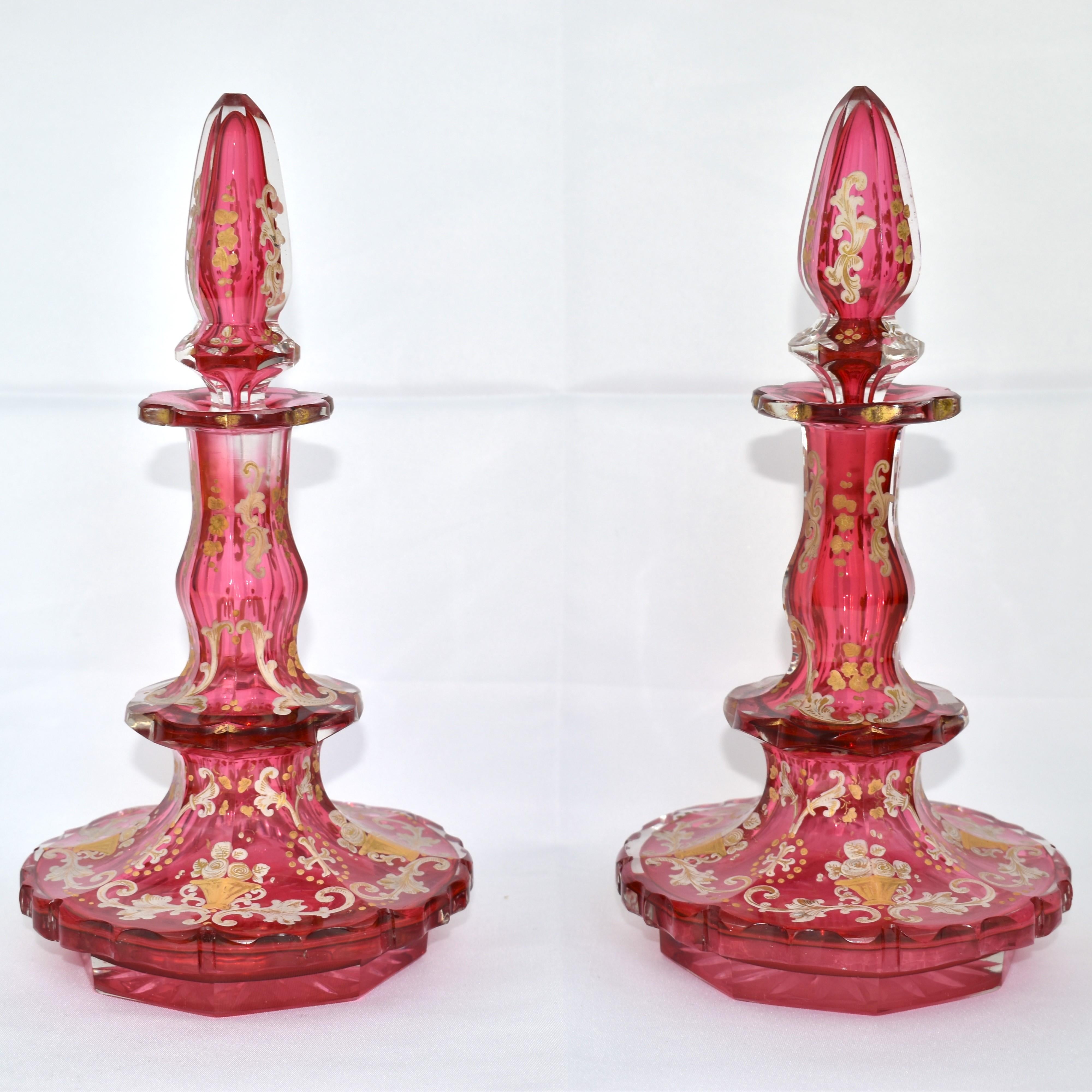 Gilt ANTIQUE PAIR OF BOHEMIAN CRANBERRY GLASS ENAMELLED PERFUME BOTTLES, 19th CENTURY For Sale