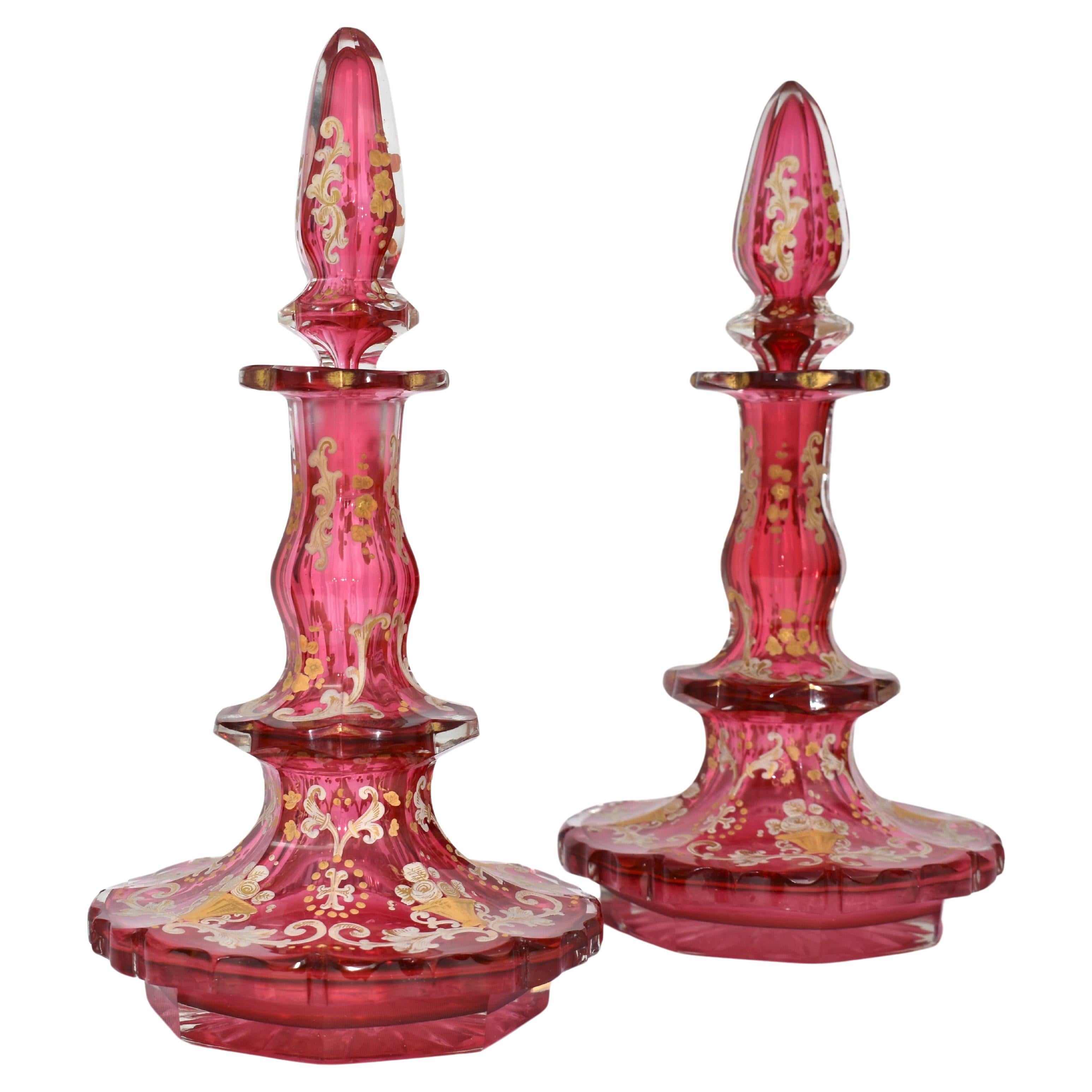 ANTIQUE PAIR OF BOHEMIAN CRANBERRY GLASS ENAMELLED PERFUME BOTTLES, 19th CENTURY For Sale