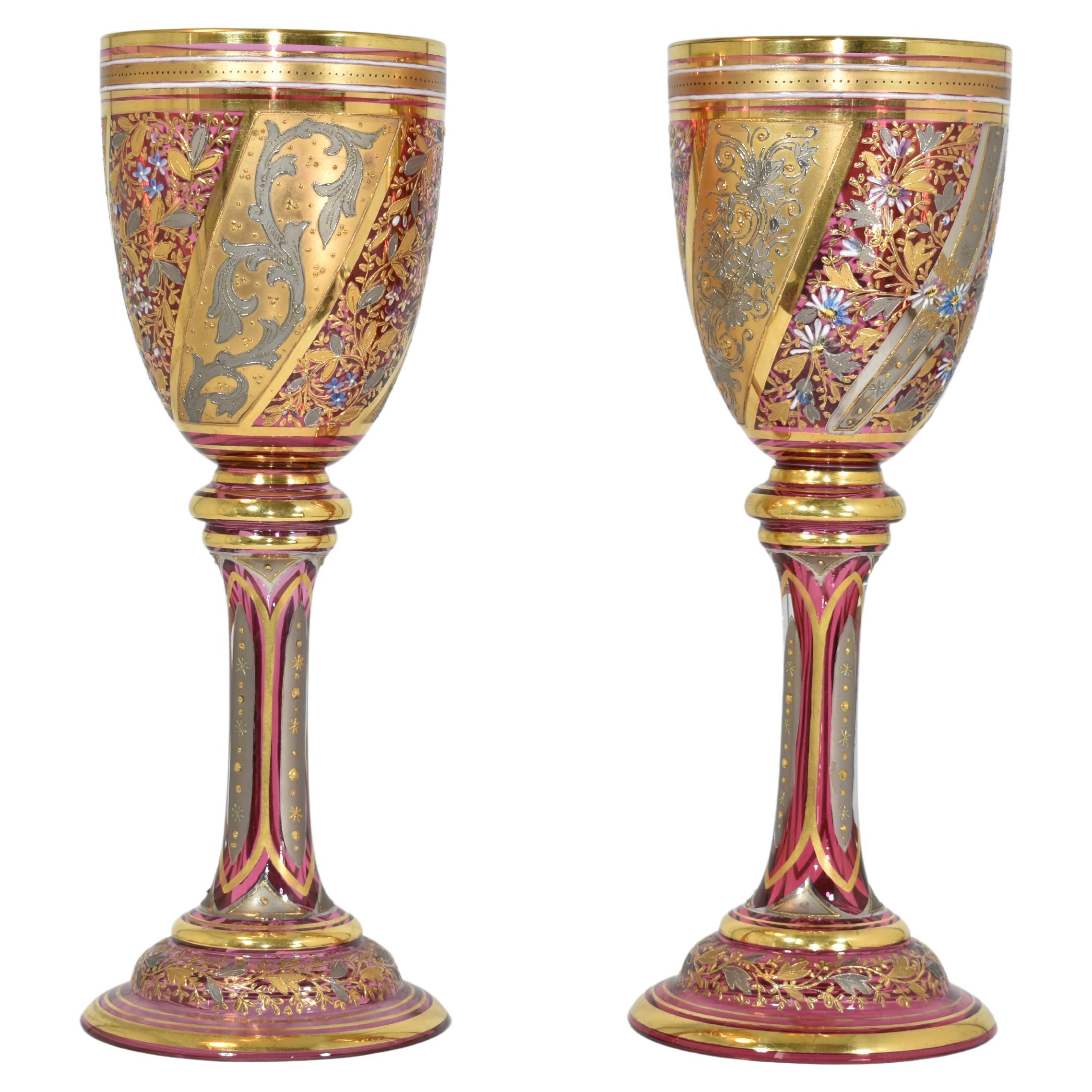 Two exquisite cranberry crystal glasses in excellant condition

Hand-painted with rich gilding highlights and colorfull enamel decoration

Very fine exapmle of the luxury Moser Glassware

Bohemia, 19th Century.