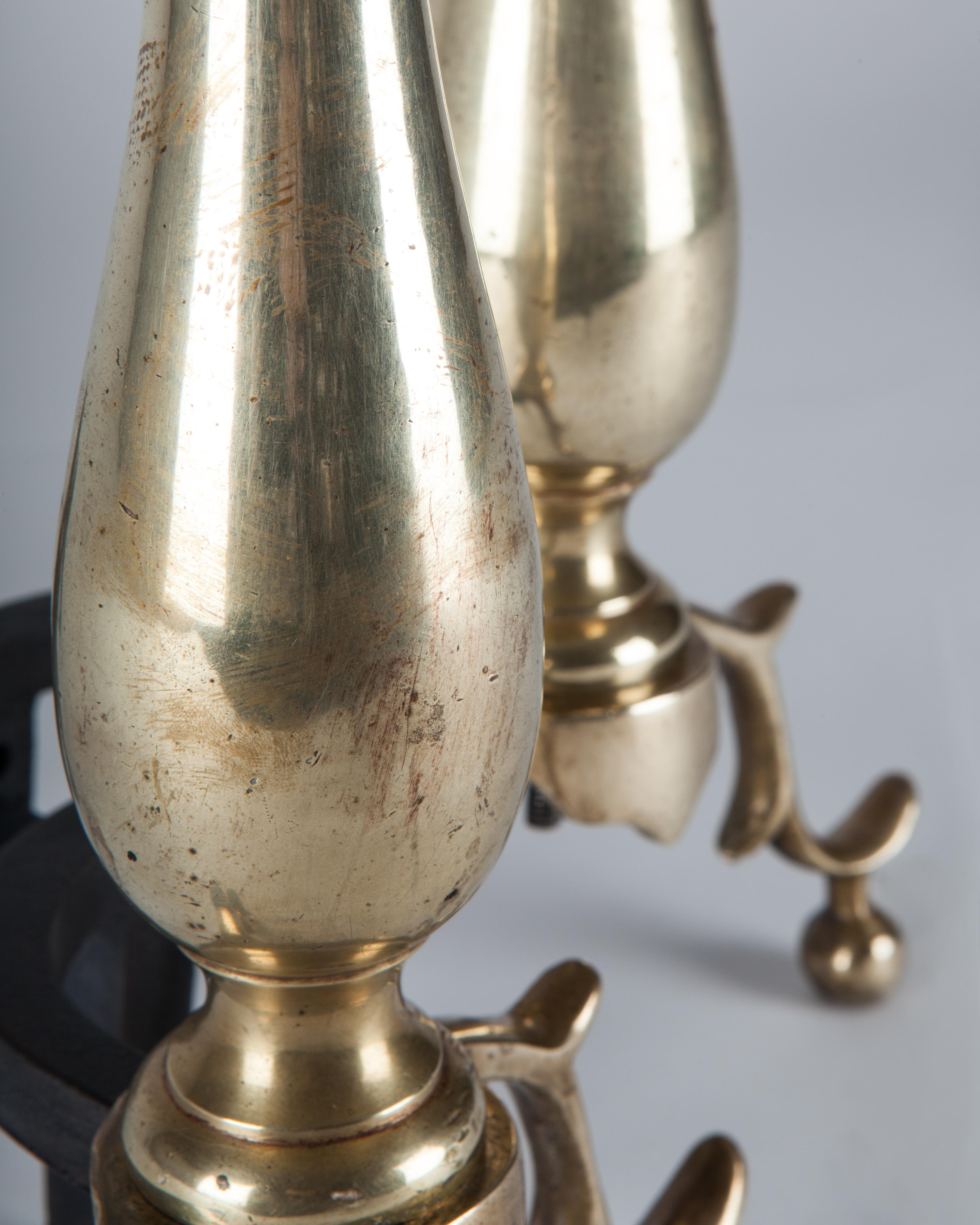 Blackened Antique Pair of Brass Baluster Turned Andirons with Cast Legs, circa 1920
