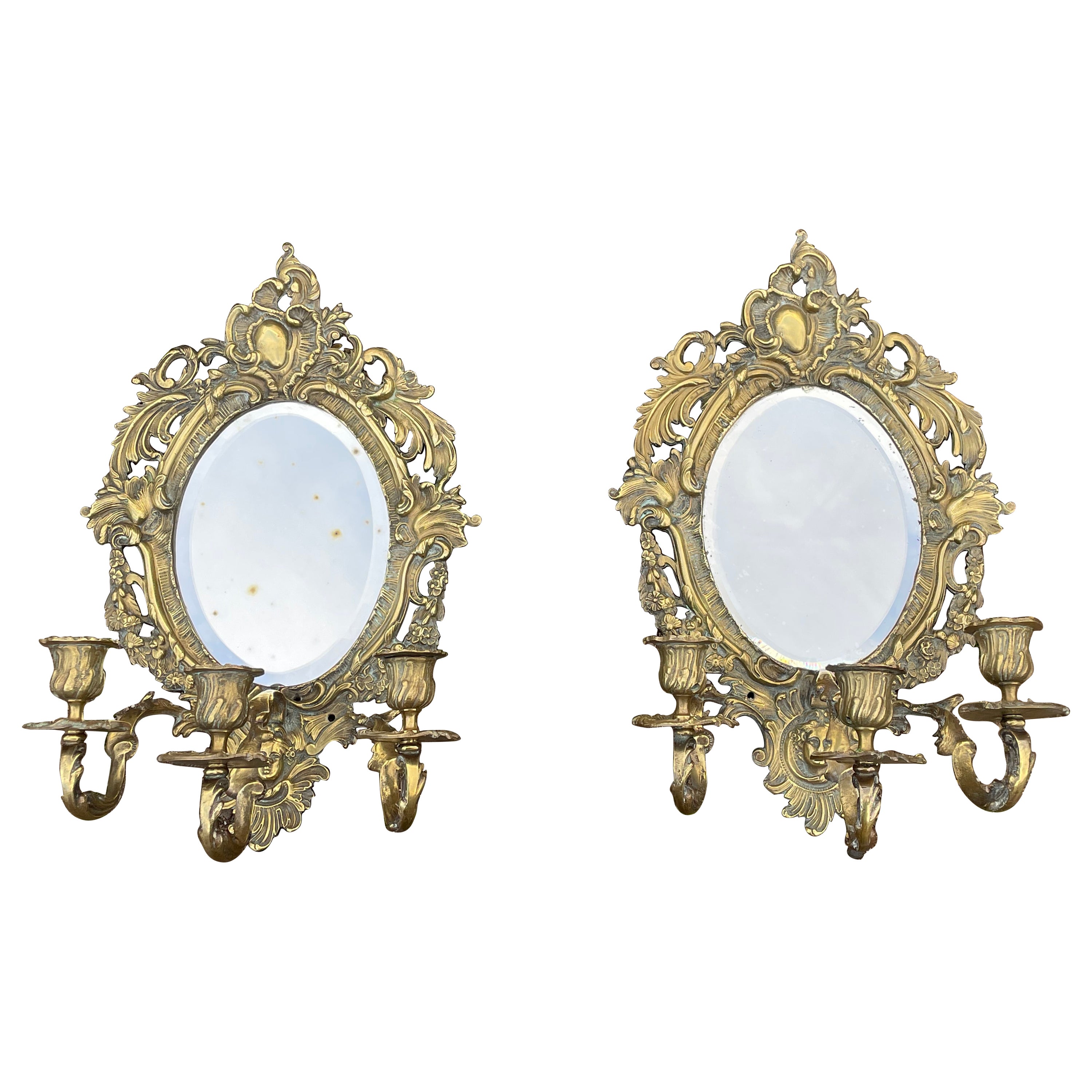 Pareja de antiguos candelabros de pared de bronce con. Espejos Biselados y Máscara de Diosa