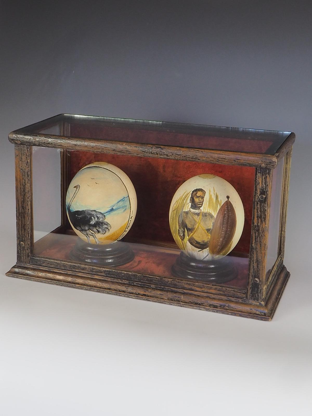 Ostrich Eggshell Antique Pair of Cased South African Ostrich Eggs Hand Painted For Sale