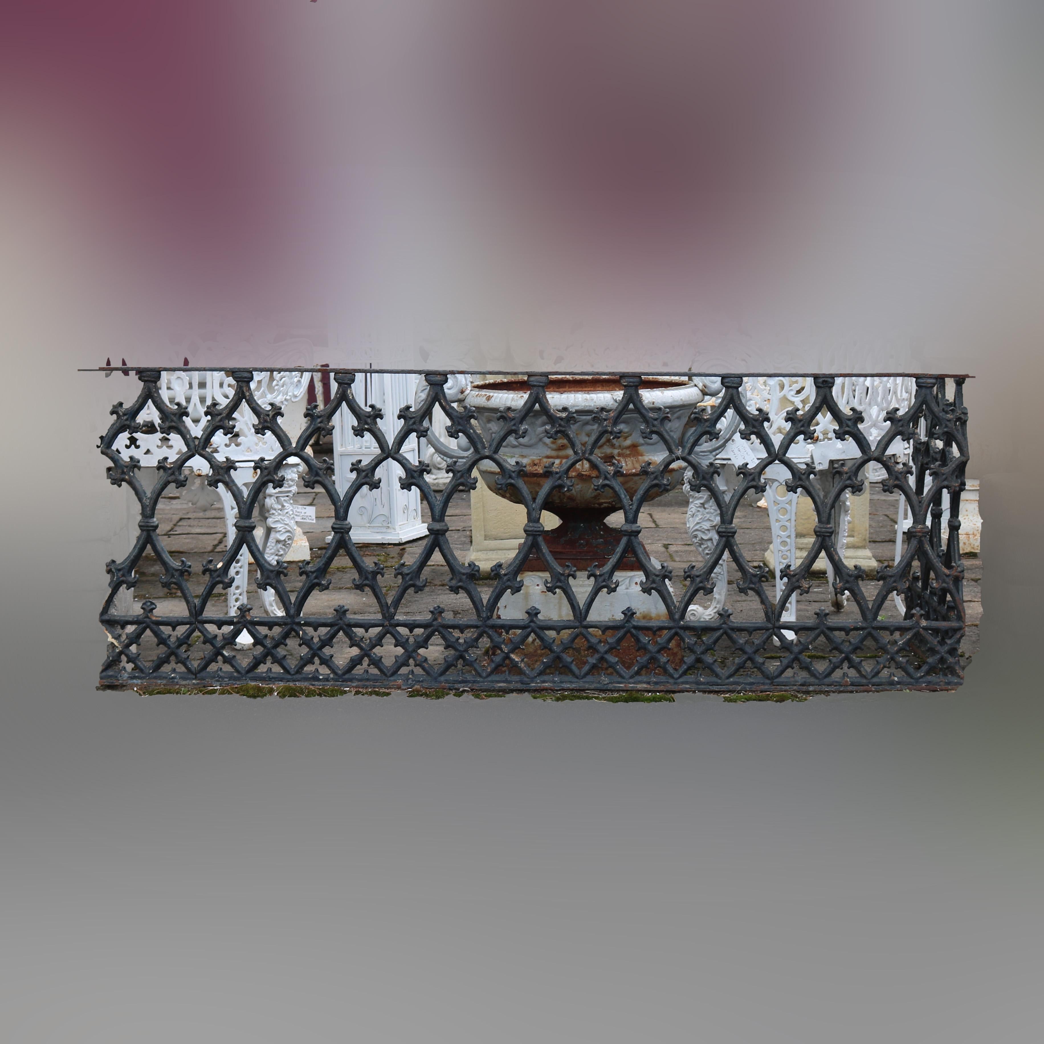 A pair of antique balcony or fencing corners offer cast iron construction with scroll lattice design, painted black, architectural elements, 19h century.

Measures: 71.5