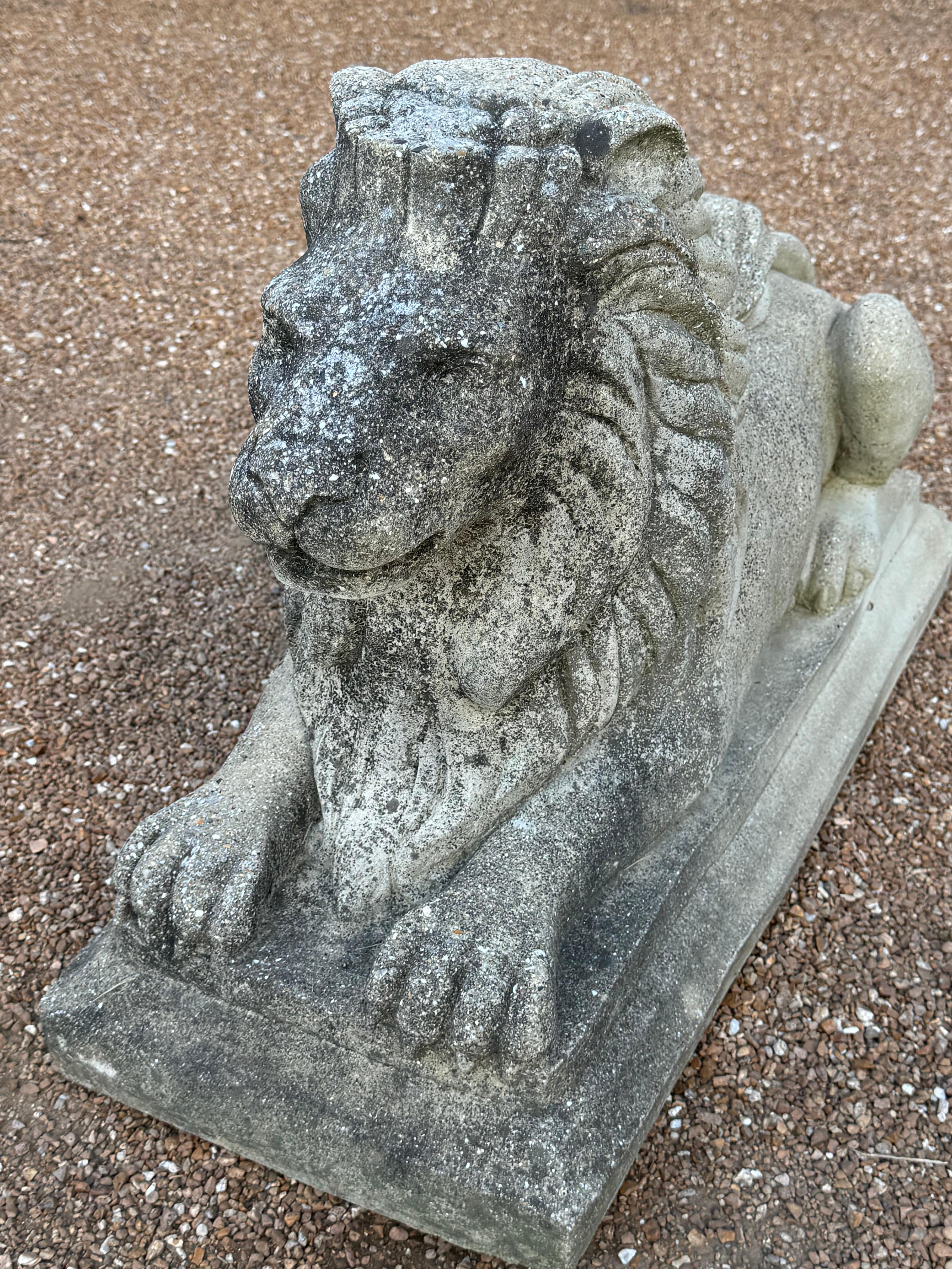 American Antique Pair of Cast Stone Recumbent Entrance Way or Garden Regal Lion Statues For Sale