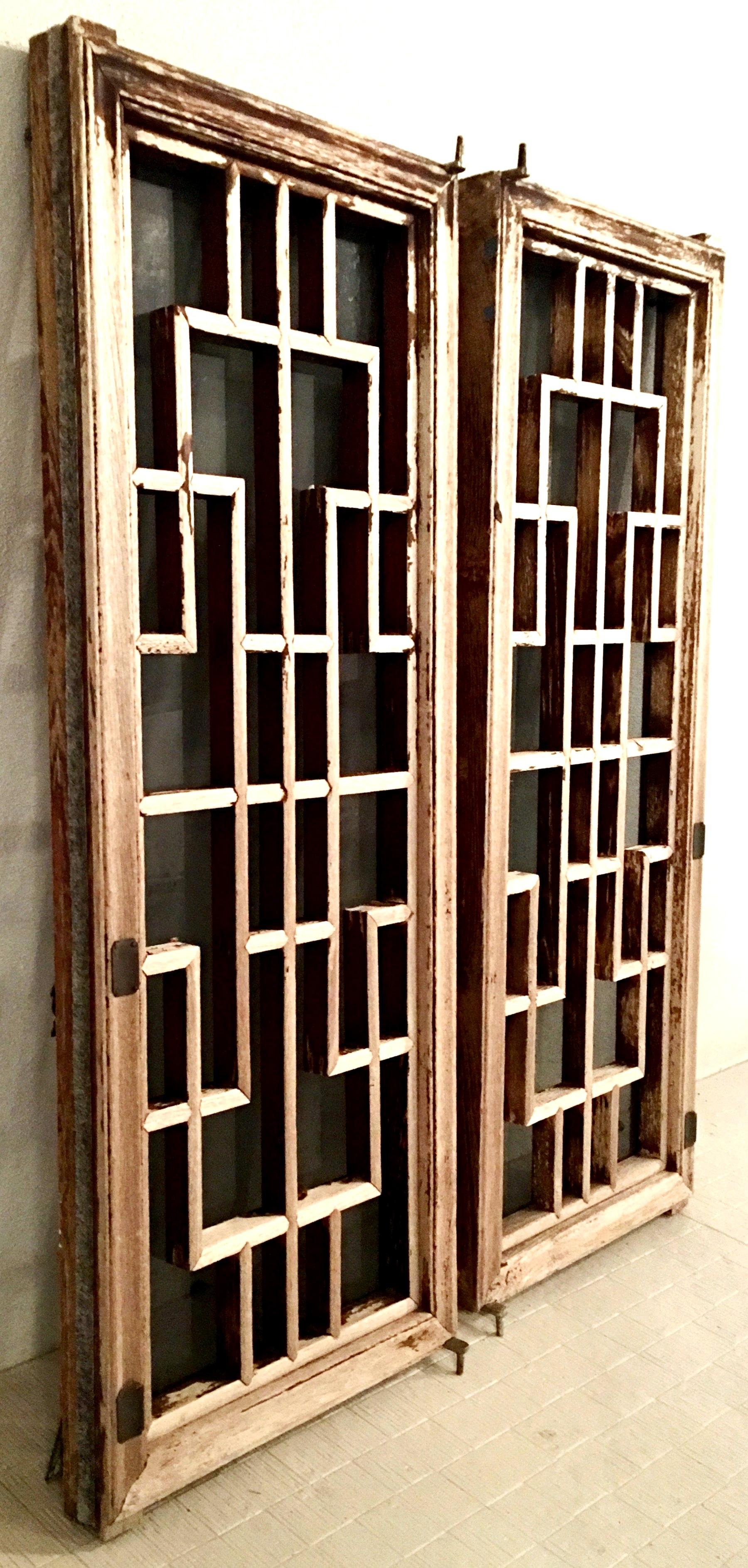Antique Pair Of Chinese Geometric Carved Mahogany & Smoke Glass Windows In Good Condition For Sale In West Palm Beach, FL