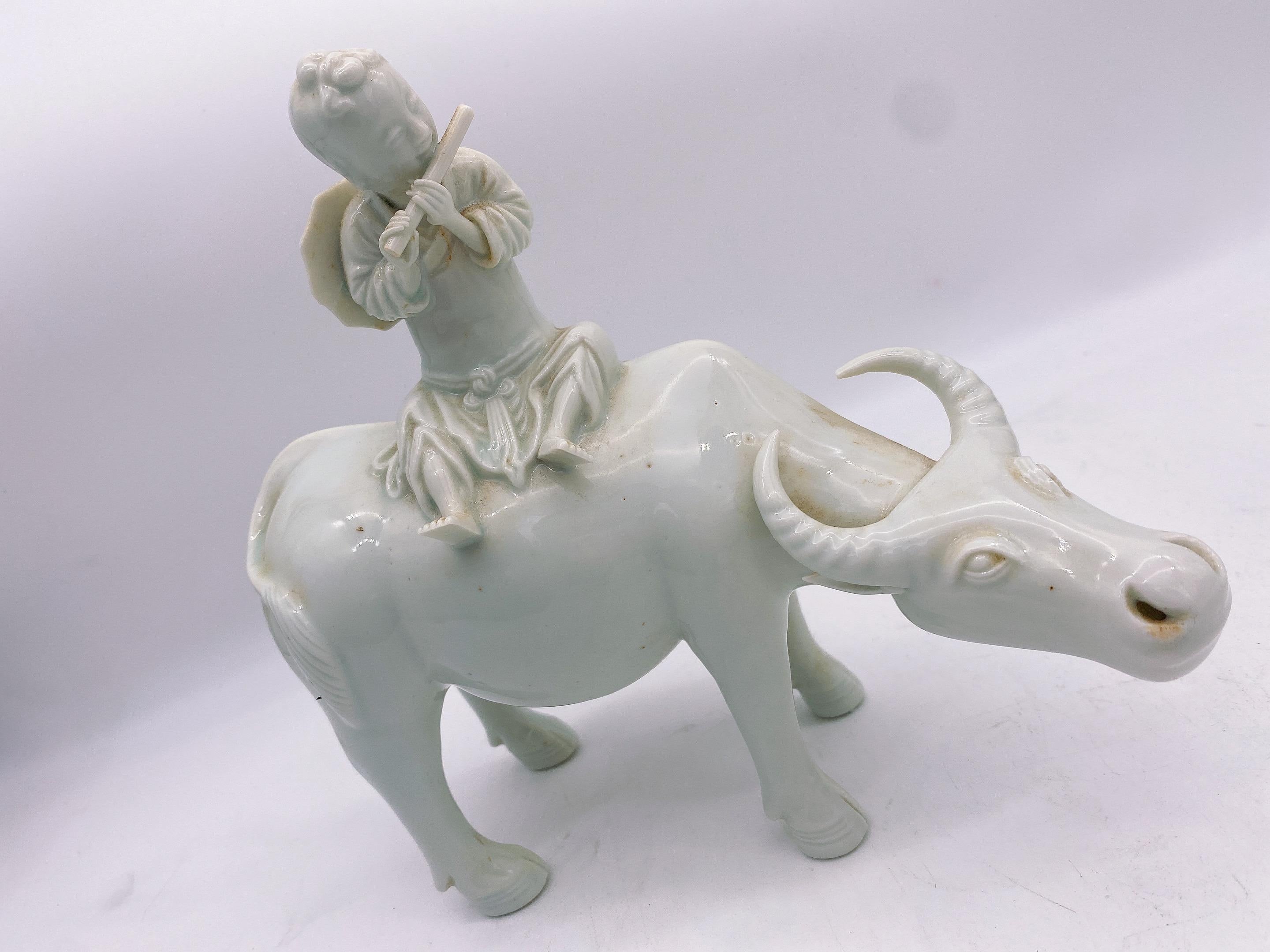 Antique Pair of Chinese Dehua Porcelain Figures of Boys on Water Buffalos For Sale 7