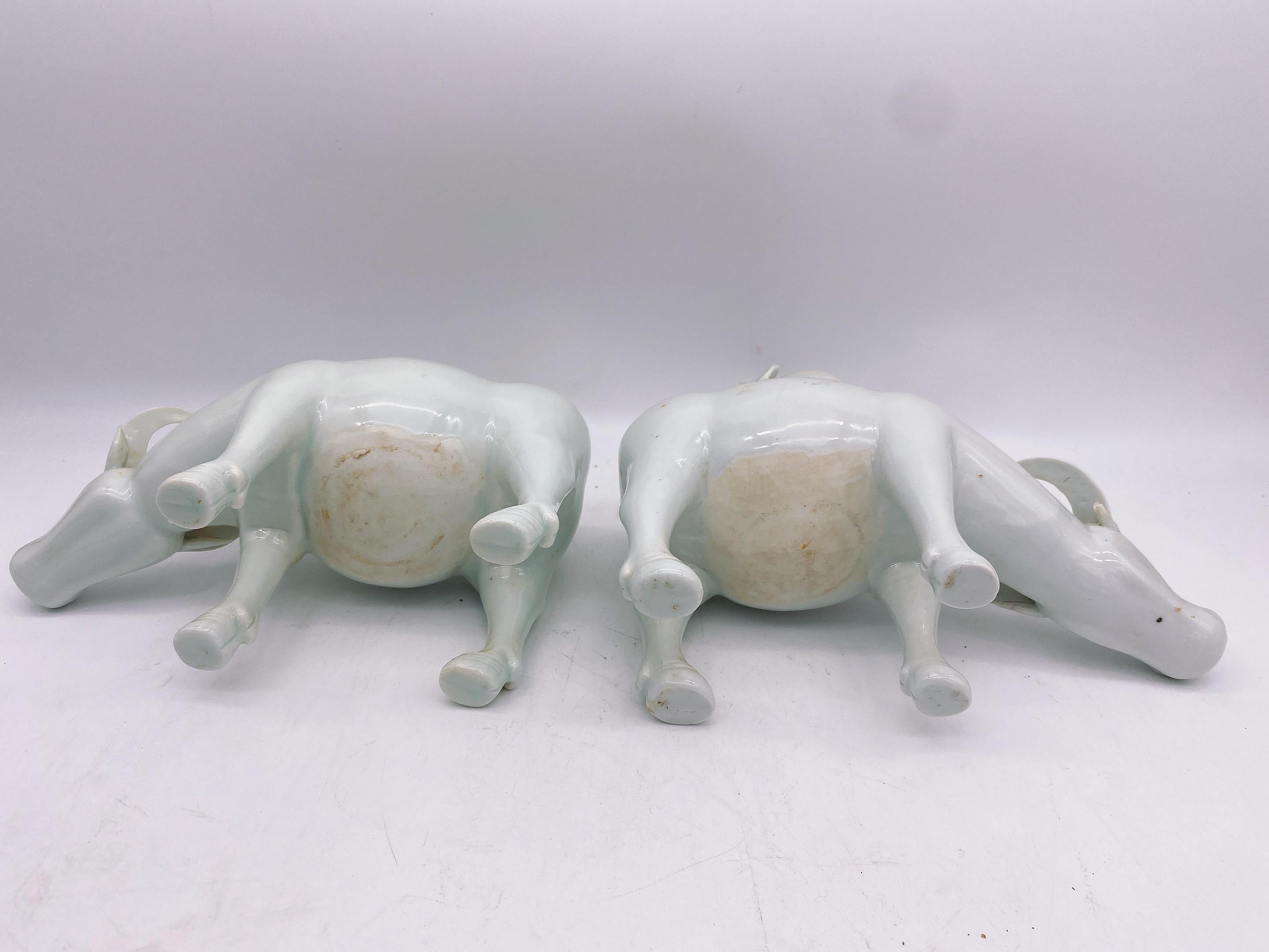 Antique Pair of Chinese Dehua Porcelain Figures of Boys on Water Buffalos In Good Condition For Sale In Brea, CA