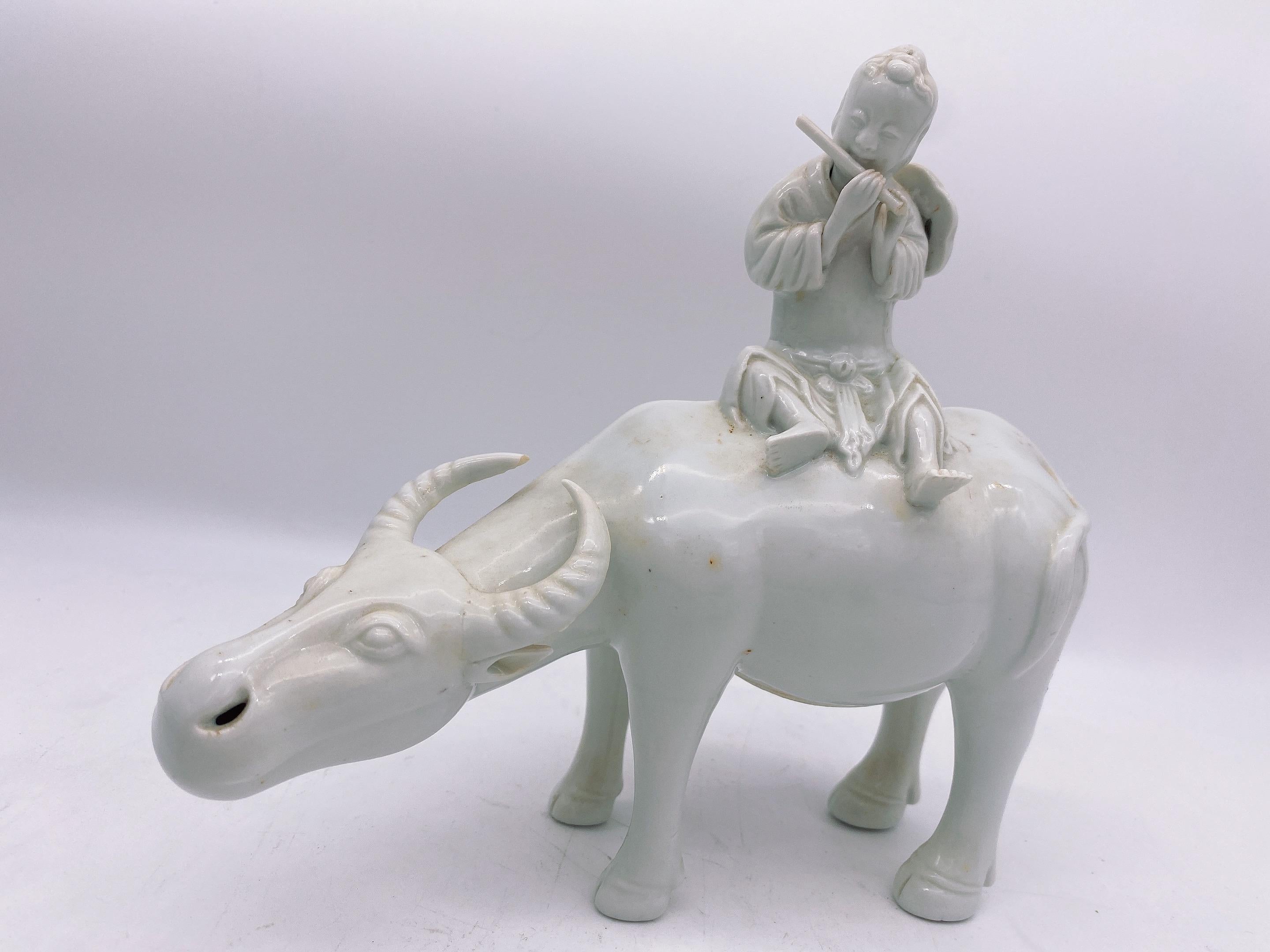 Antique Pair of Chinese Dehua Porcelain Figures of Boys on Water Buffalos For Sale 1