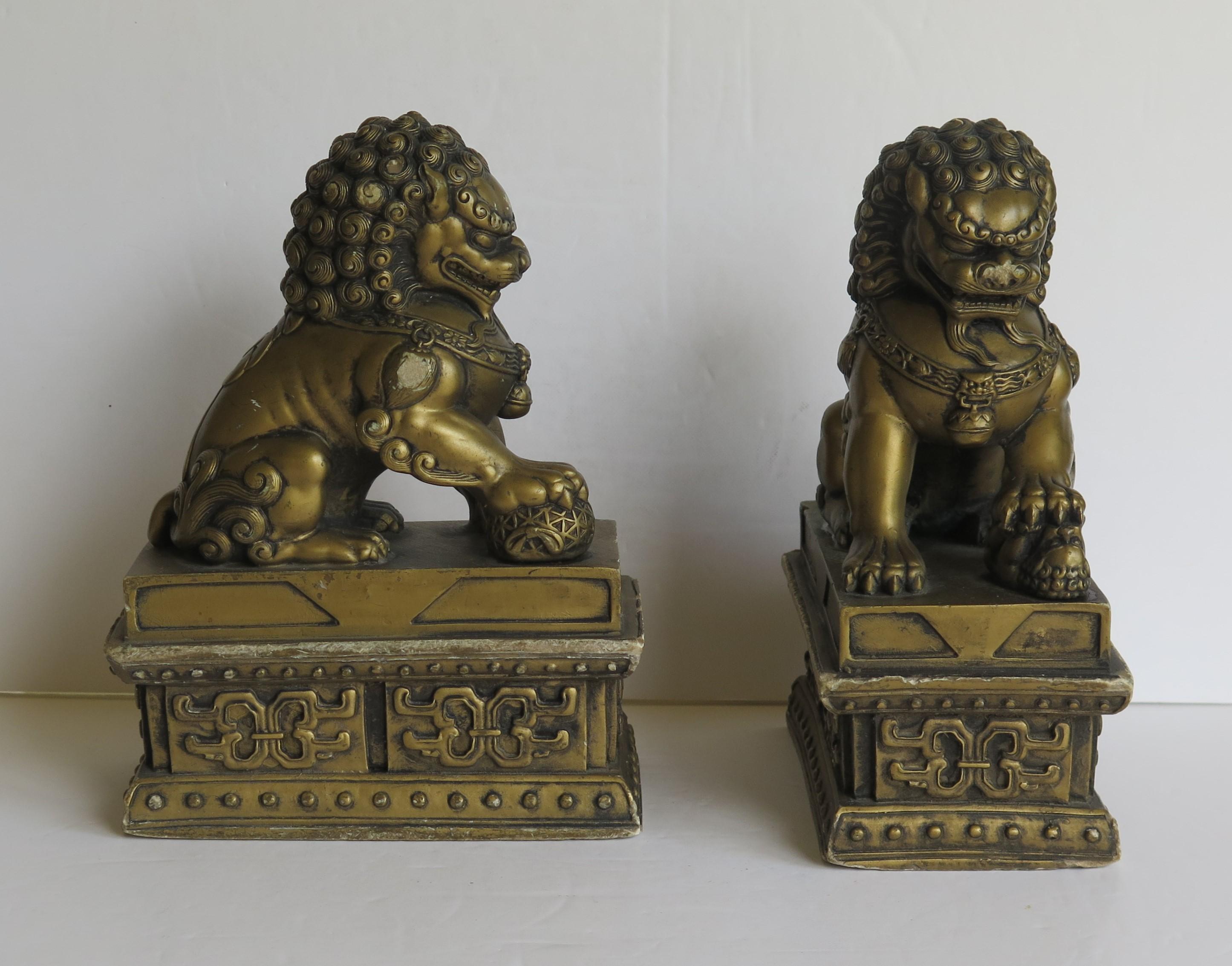 Gilt Antique Pair of Chinese Foo Dogs Gilded Stone with Fine Detail Qing 19th Century