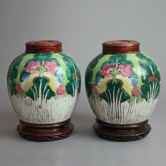 Antique Pair of Chinese Porcelain Urns with Stylized Flowers, circa 1920