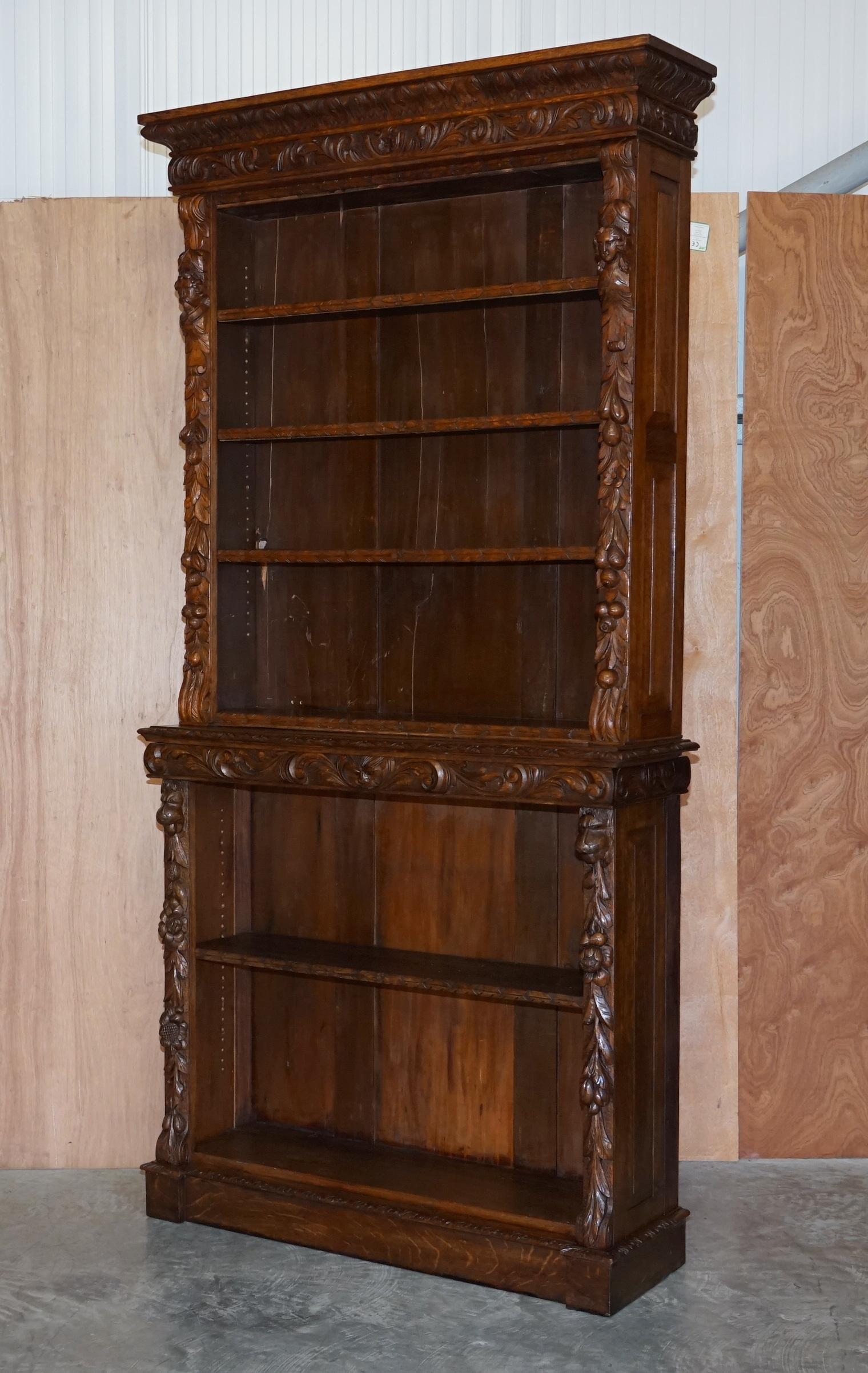 We are delighted to offer for sale this sublime pair of Antique Victorian circa 1860 Jacobean Revival hand carved oak library bookcases

These are a very large and well made pair, they come with four height adjustable and removable shelves. They