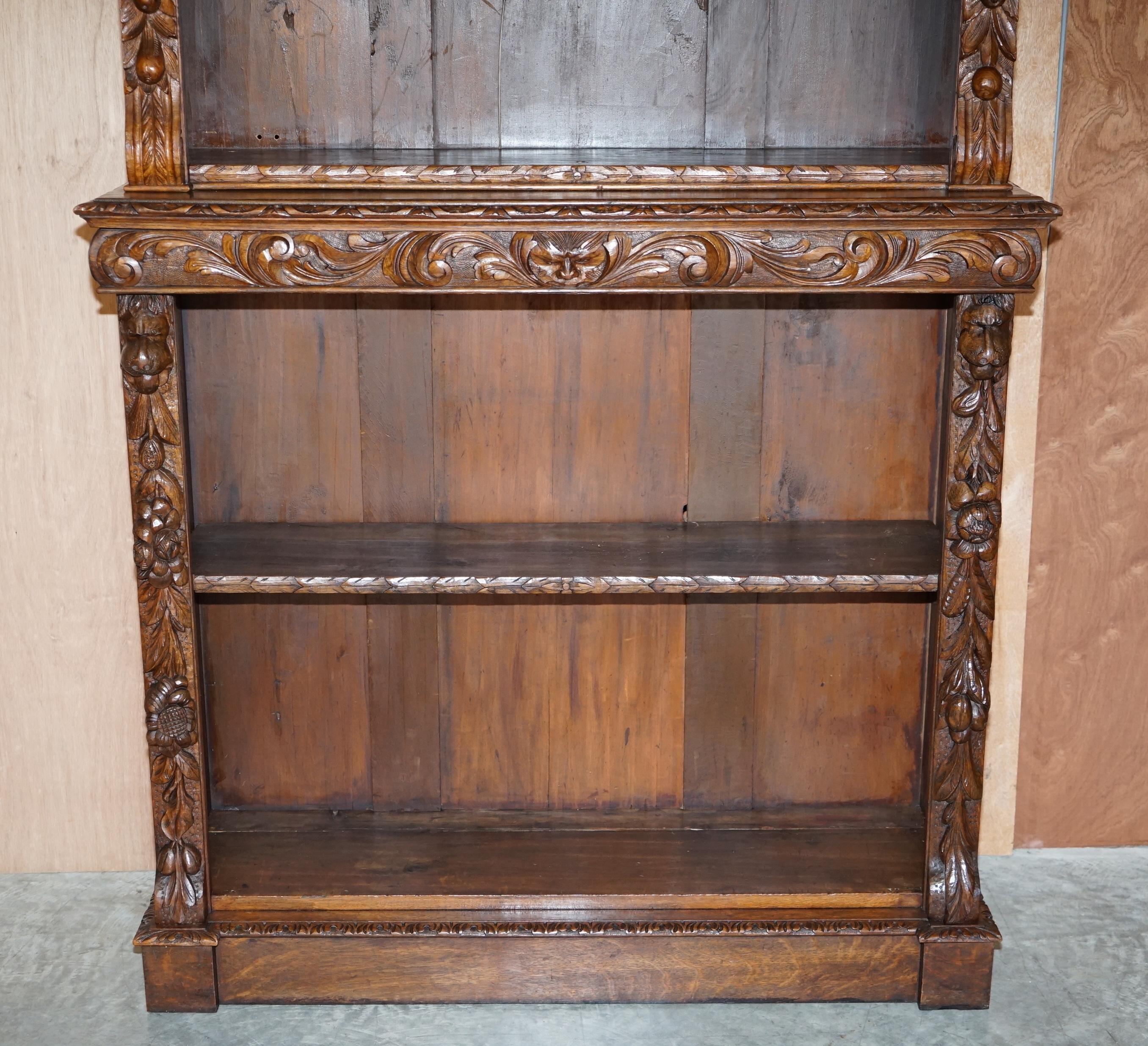 High Victorian Antique Pair of circa 1860 Jacobean Revival English Carved Oak Library Bookcases