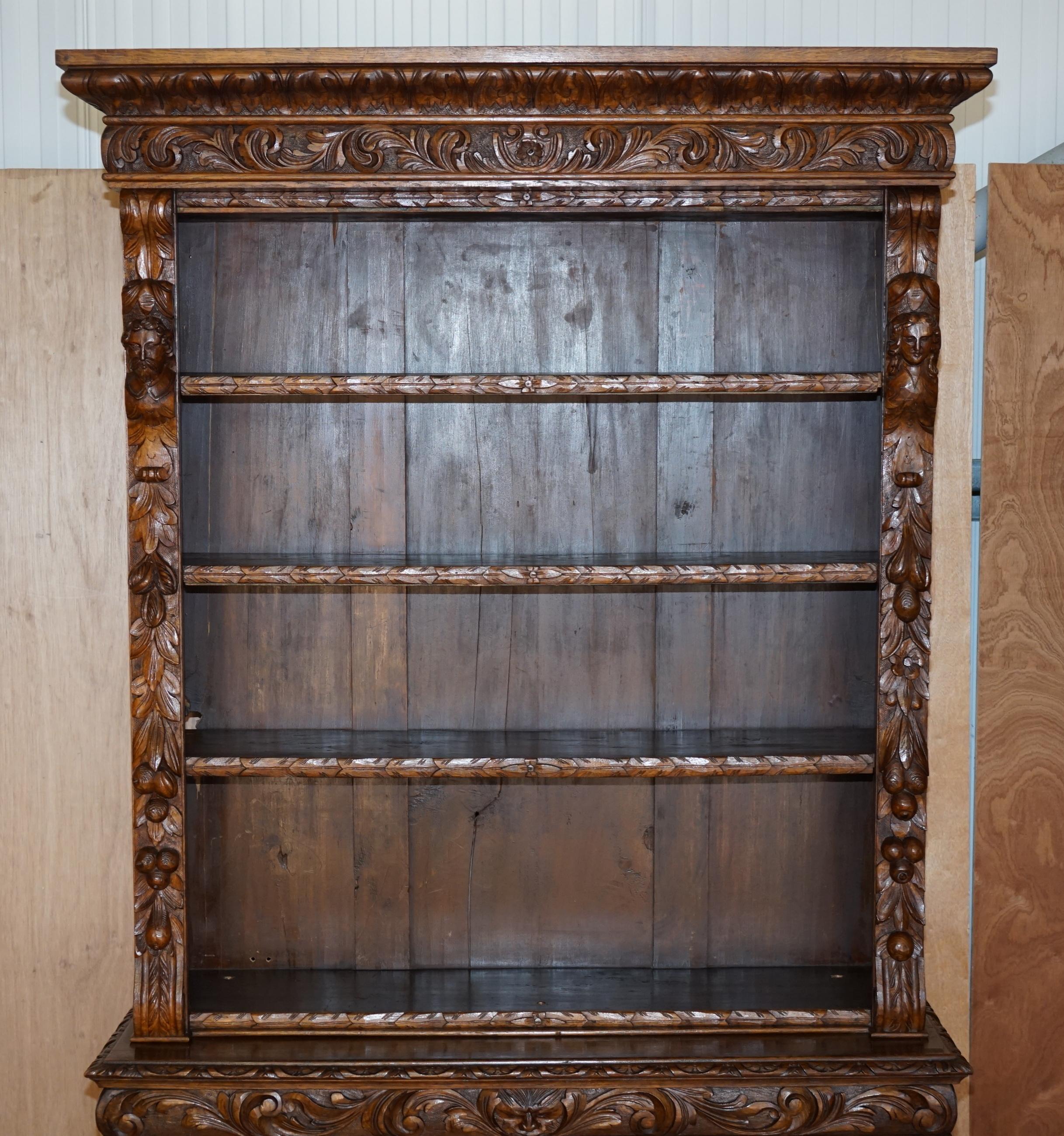 Hand-Crafted Antique Pair of circa 1860 Jacobean Revival English Carved Oak Library Bookcases