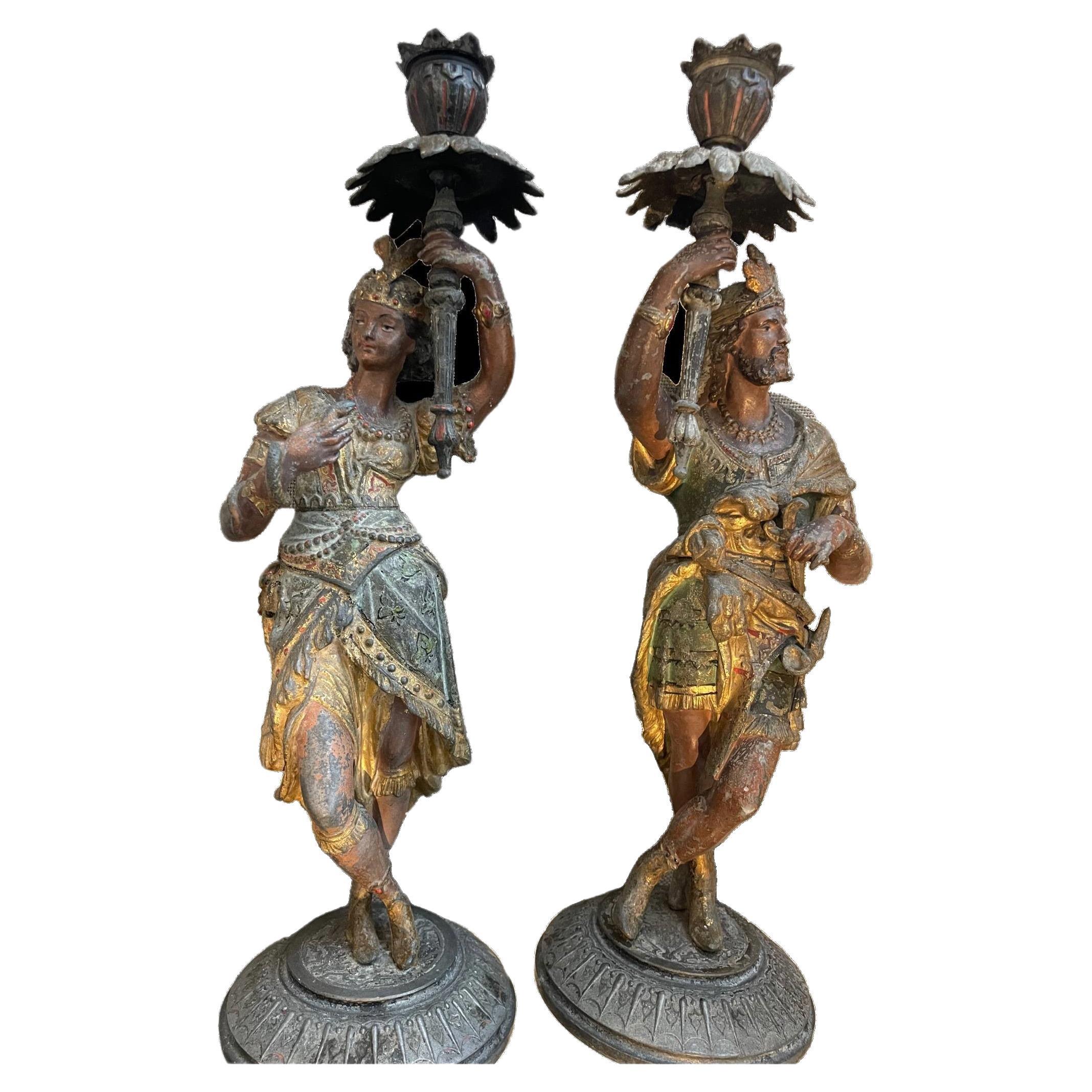 Antique Pair of Cold Painted Regal Man & Woman White Meta Figural Candlesticks For Sale