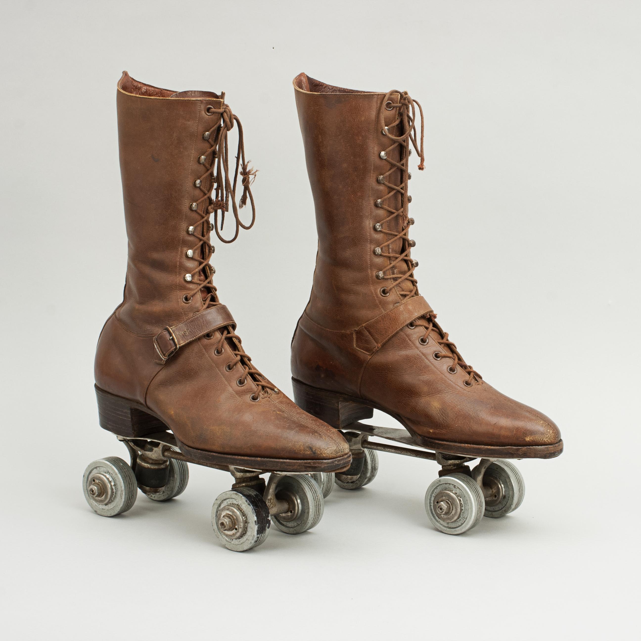 Vintage ladies roller skates.
Pair of early 'Dexter Roller Skates' with metal wheels. The base of the skates marked 'Dexter Skates'. The roller skates are screwed to a pair of ladies high top lace up brown leather boots, size 5. A great vintage