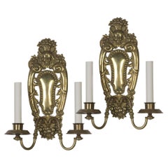 Antique Two Arm Brass E. F. Caldwell Sconces with a Fruit and Foliate Motif, Circa 1910s
