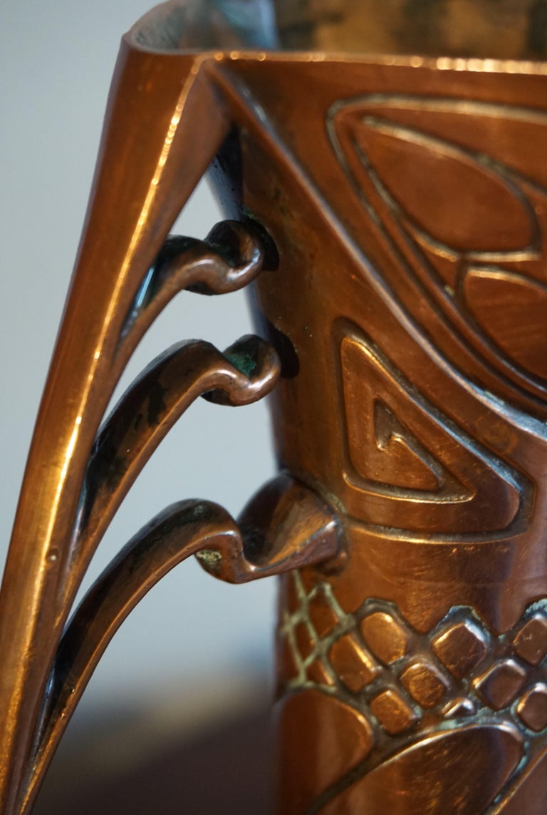 Antique Pair of Embossed Copper Arts and Crafts Vases by Carl Deffner