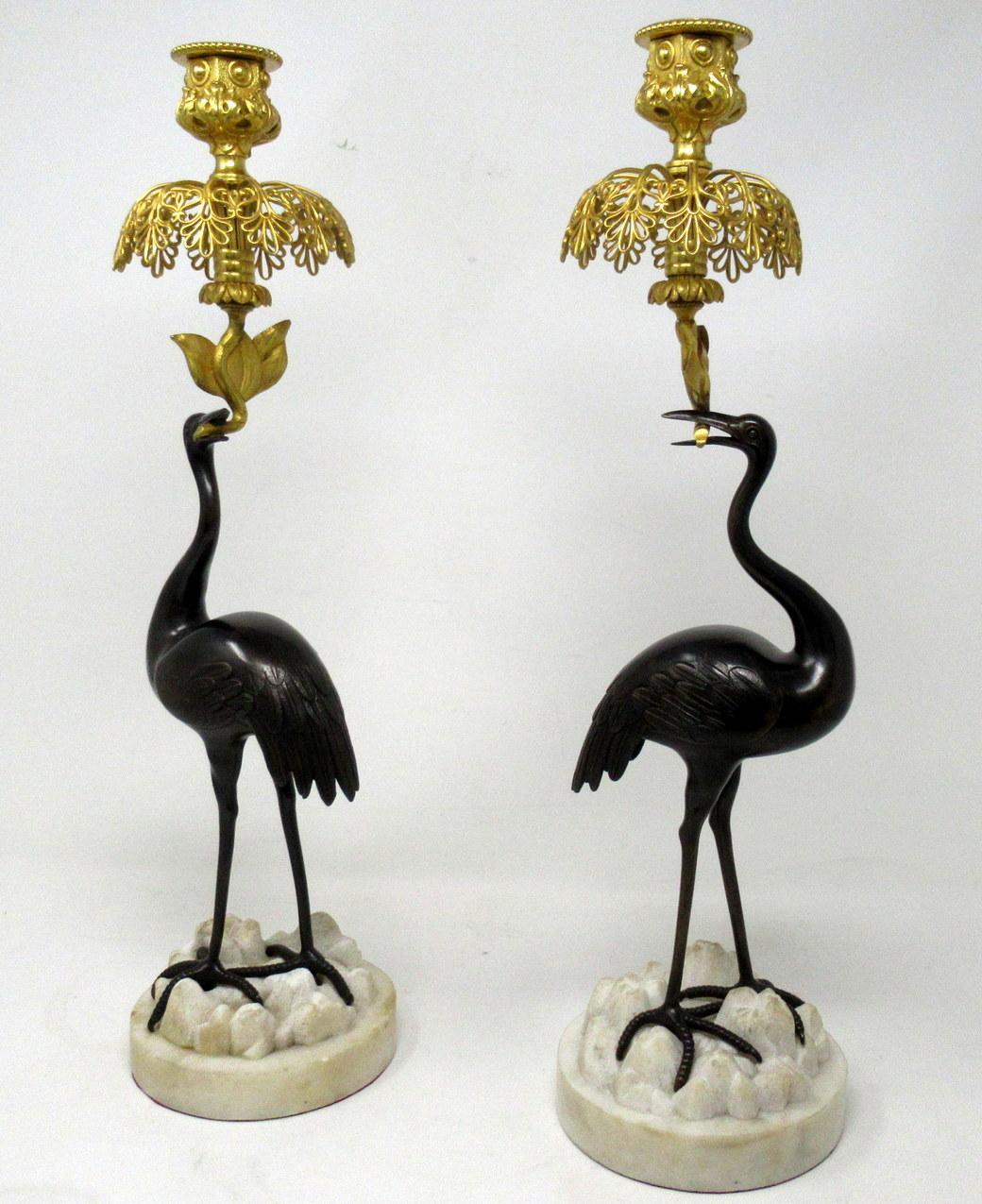 Stunning Pair of English Ormolu and Patinated Bronze Single Light Candlesticks of good size proportions modelled as a Pair of tall standing Storks, firmly attributed to ABBOTT. Circa 1840-60. 

Each exquisitely modelled as standing Storks or Cranes