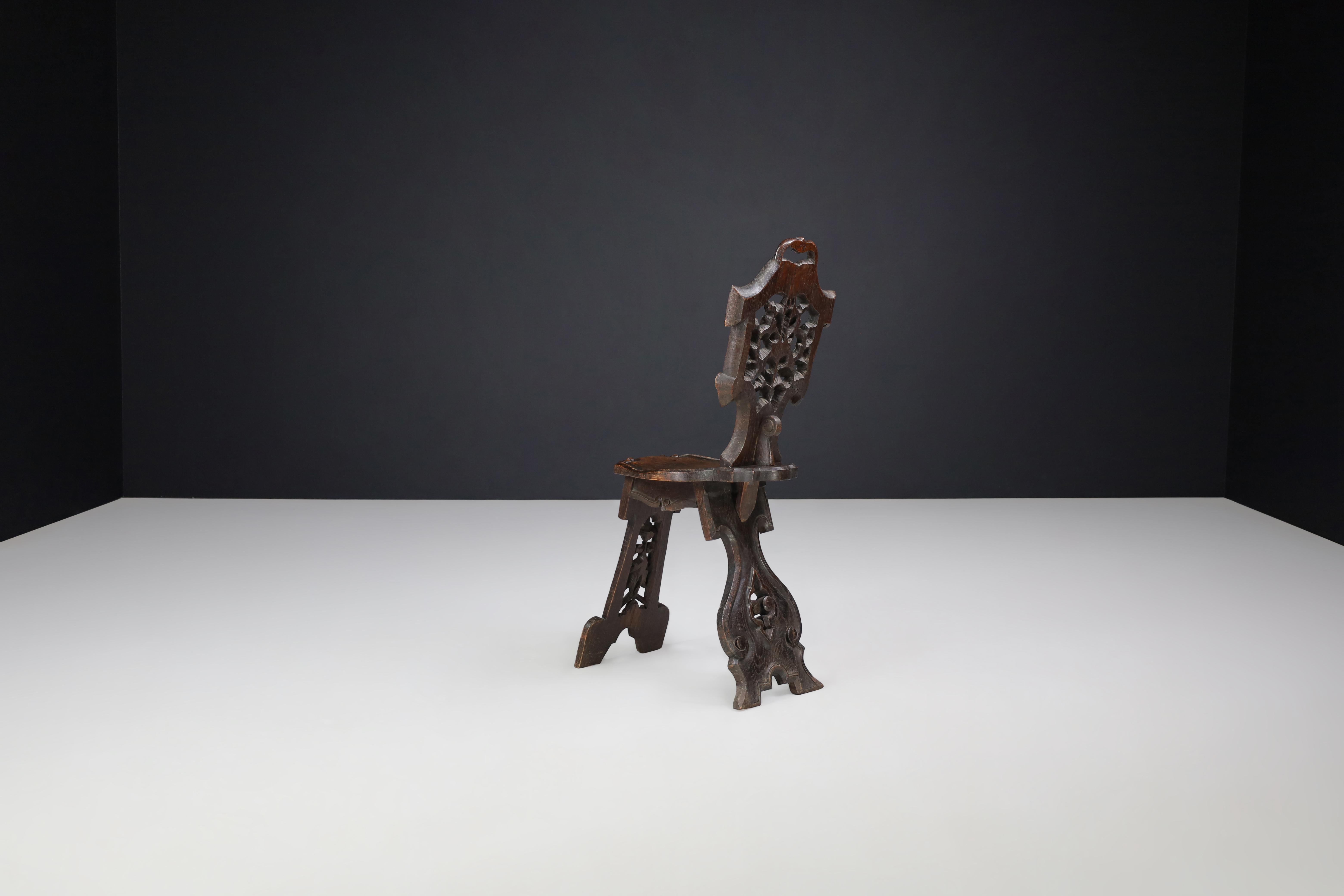 19th Century Antique Pair of Figural Heavily Carved Oak Sgabello Chairs Italy For Sale