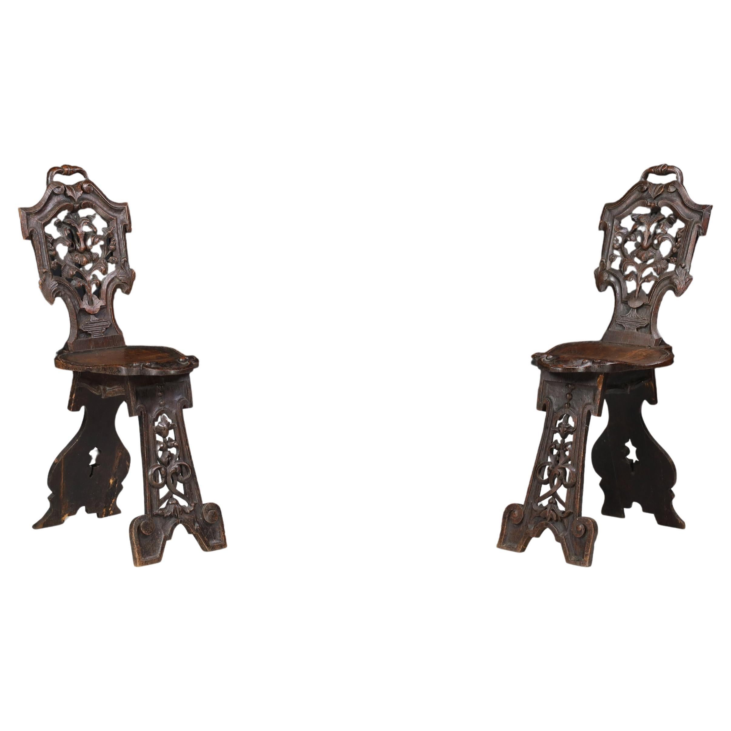 Antique Pair of Figural Heavily Carved Oak Sgabello Chairs Italy For Sale