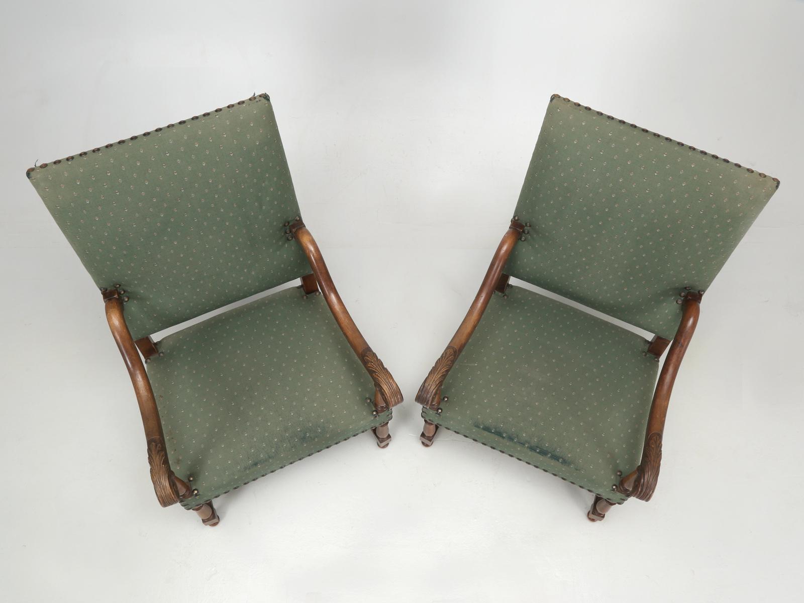 Antique pair of French arm or throne chairs, that we discovered In the Toulouse, France. The French armchairs are being offered in their as found condition, although they are quite usable as they are. We have priced this pair of antique French