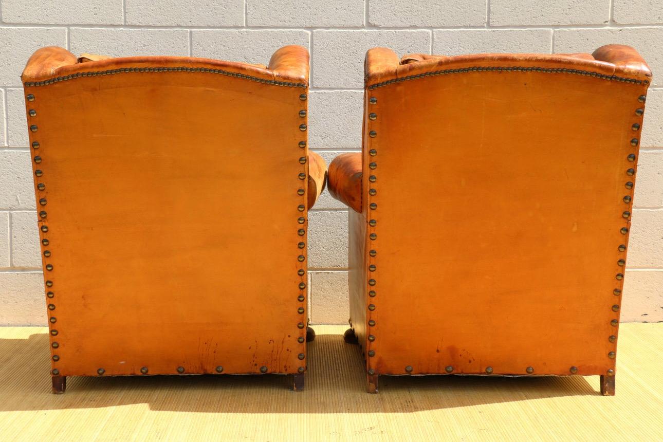 19th Century Antique Pair of French Art Deco Distressed Brown Leather Wingback Lounge Chairs For Sale