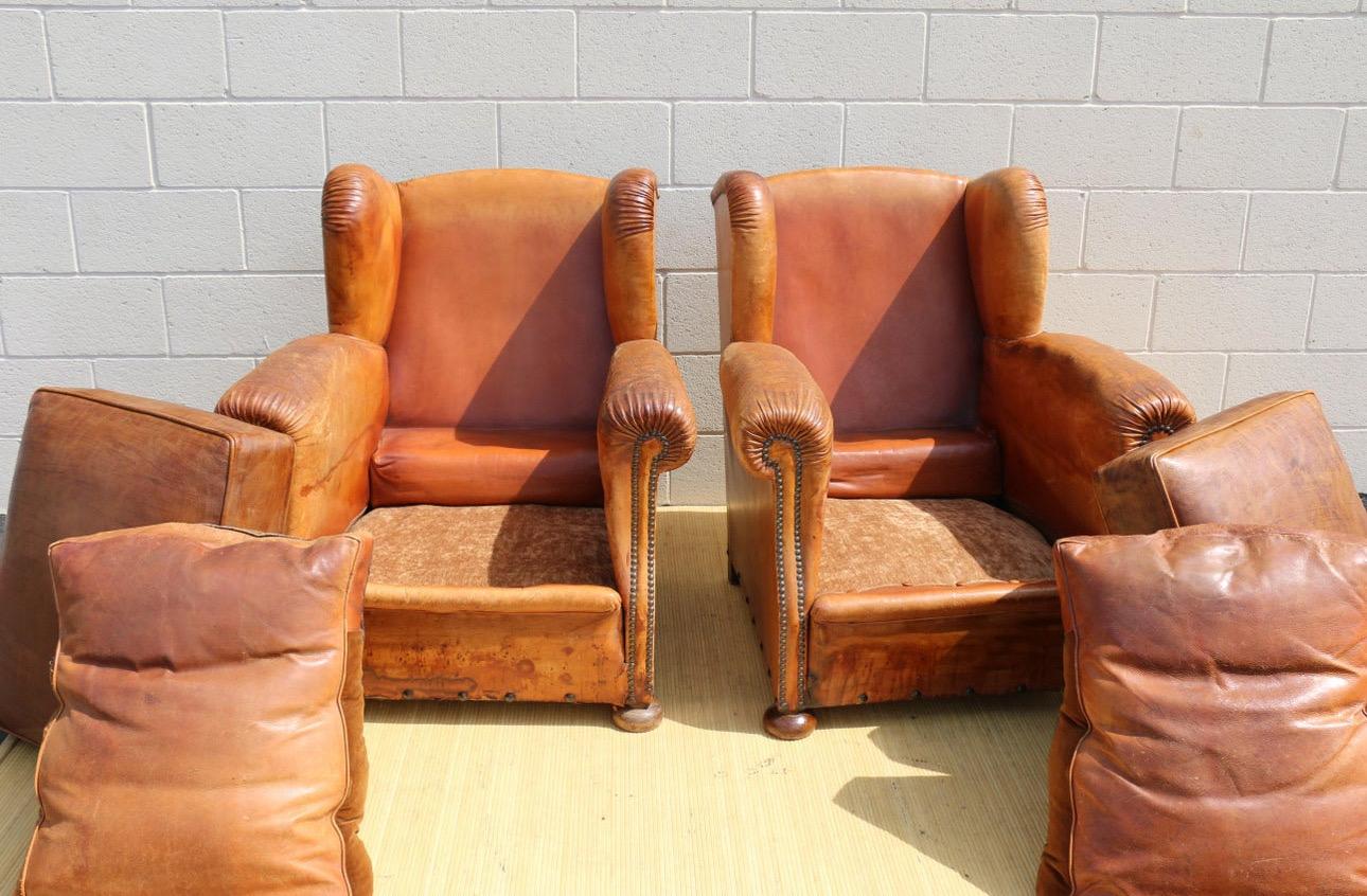 Antique Pair of French Art Deco Distressed Brown Leather Wingback Lounge Chairs For Sale 2