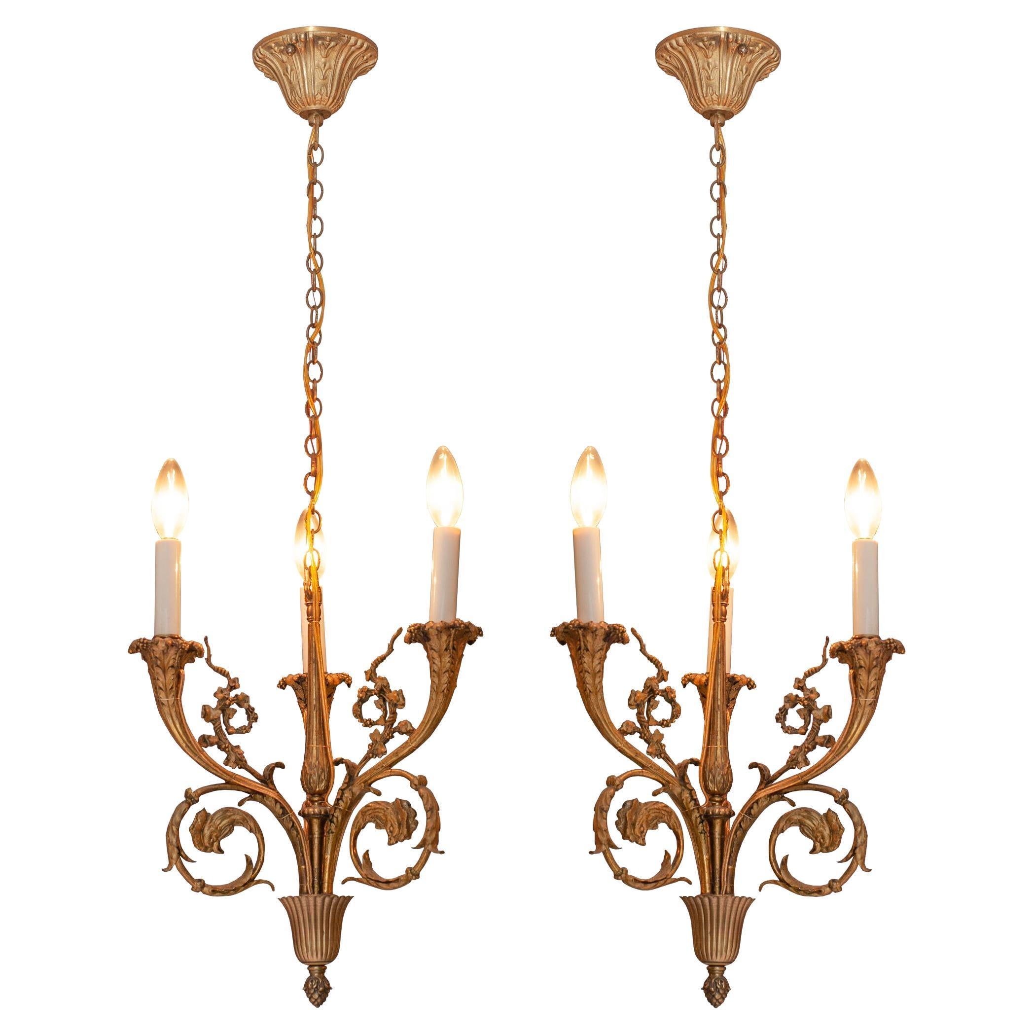 Antique Pair of French Bronze Three Candle Chandeliers with Rooster Motif