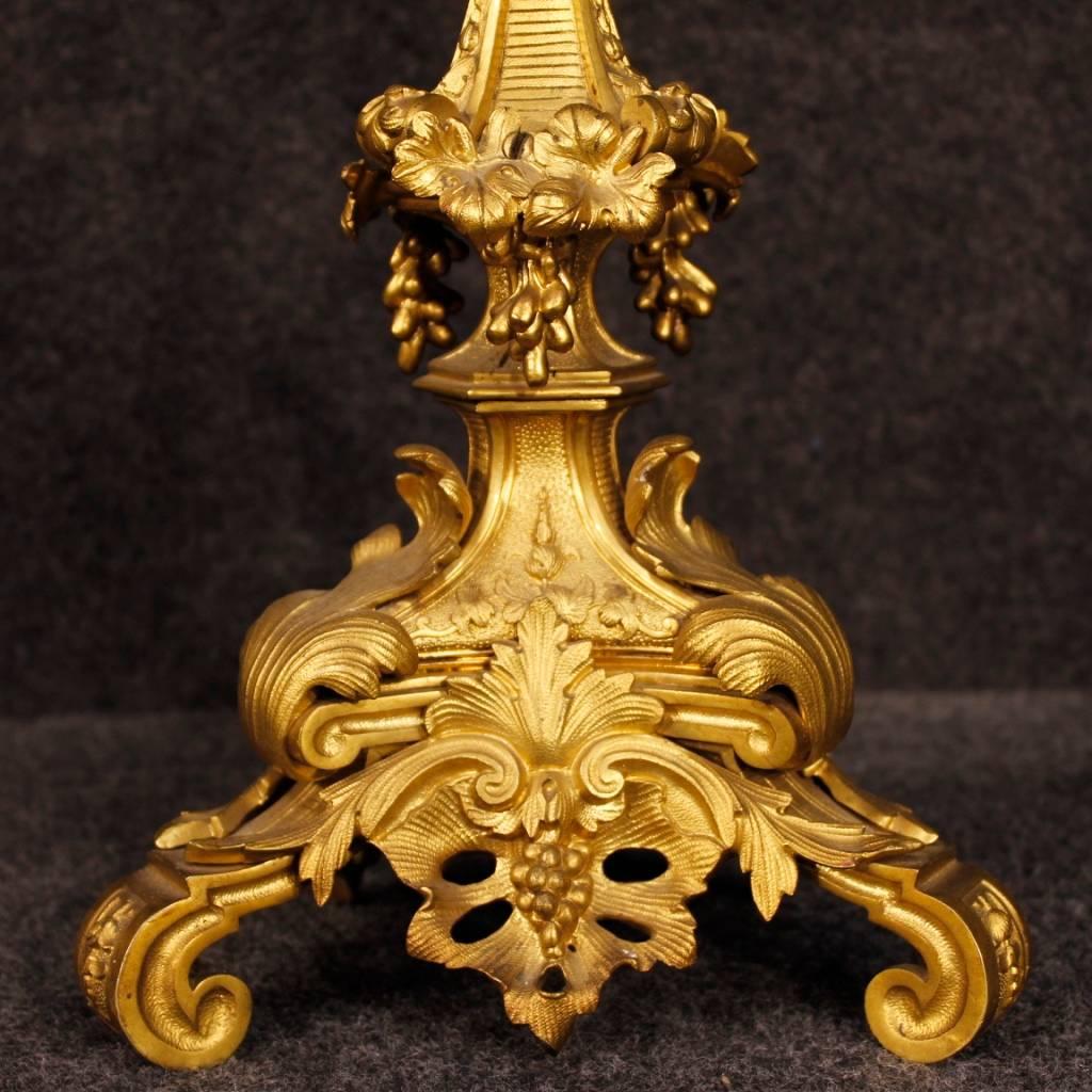 Pair of French candelabras from the late 19th century. Objects in richly gilded and chiselled bronze of fabulous quality. Six lights candlesticks of great size and impact. Objects for antique dealers and collectors in excellent state of conservation