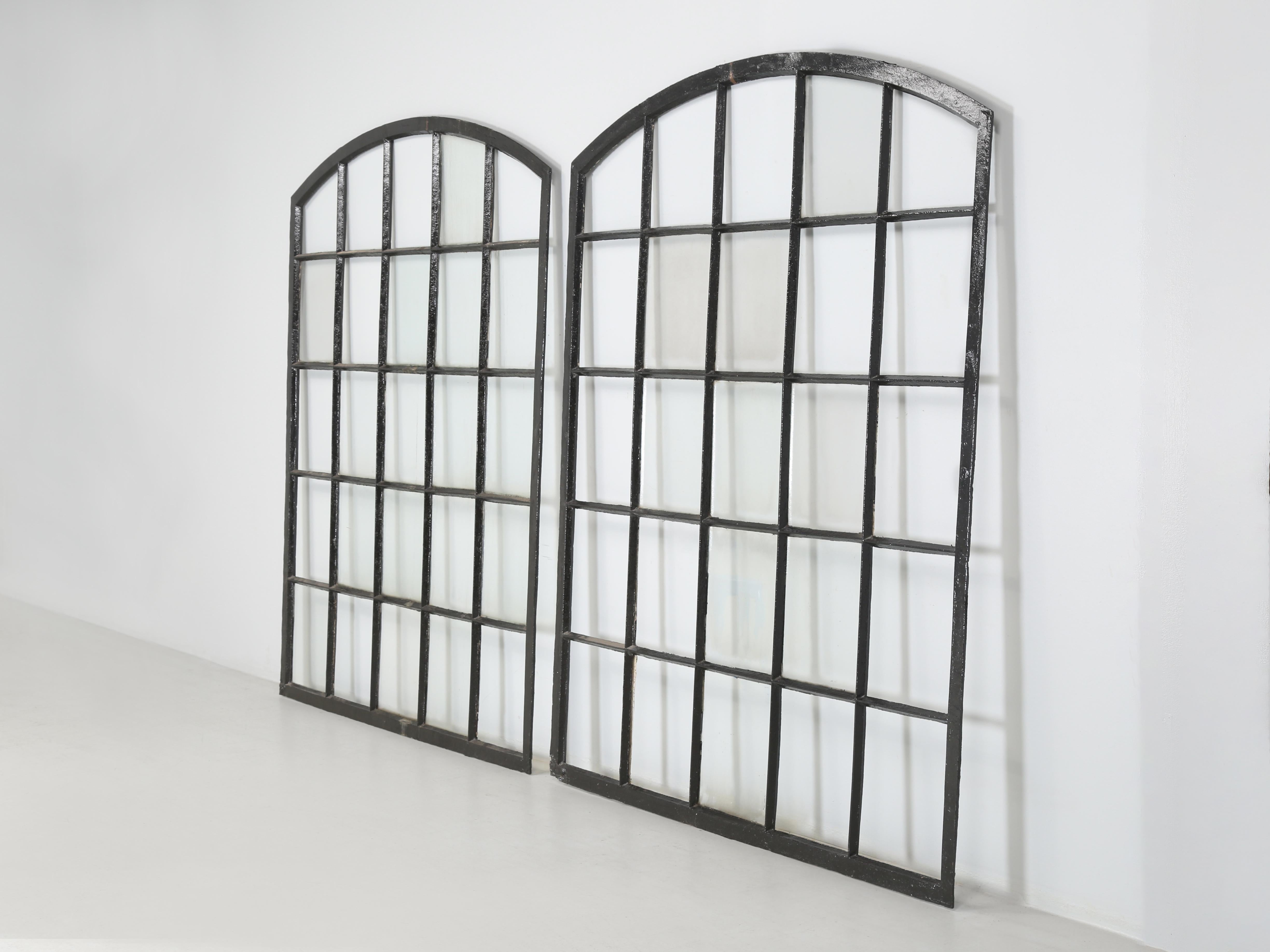 Antique Pair of French Industrial Arched Top Cast Iron Windows Frames from the late 1800's. Because they are Cast Iron Metal Windows it is difficult to know the exact date they were produced, but based on our experience we would guess between 1860