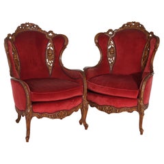 Antique Pair of French Figural Carved Walnut Fireside Wing Chairs Circa 1920