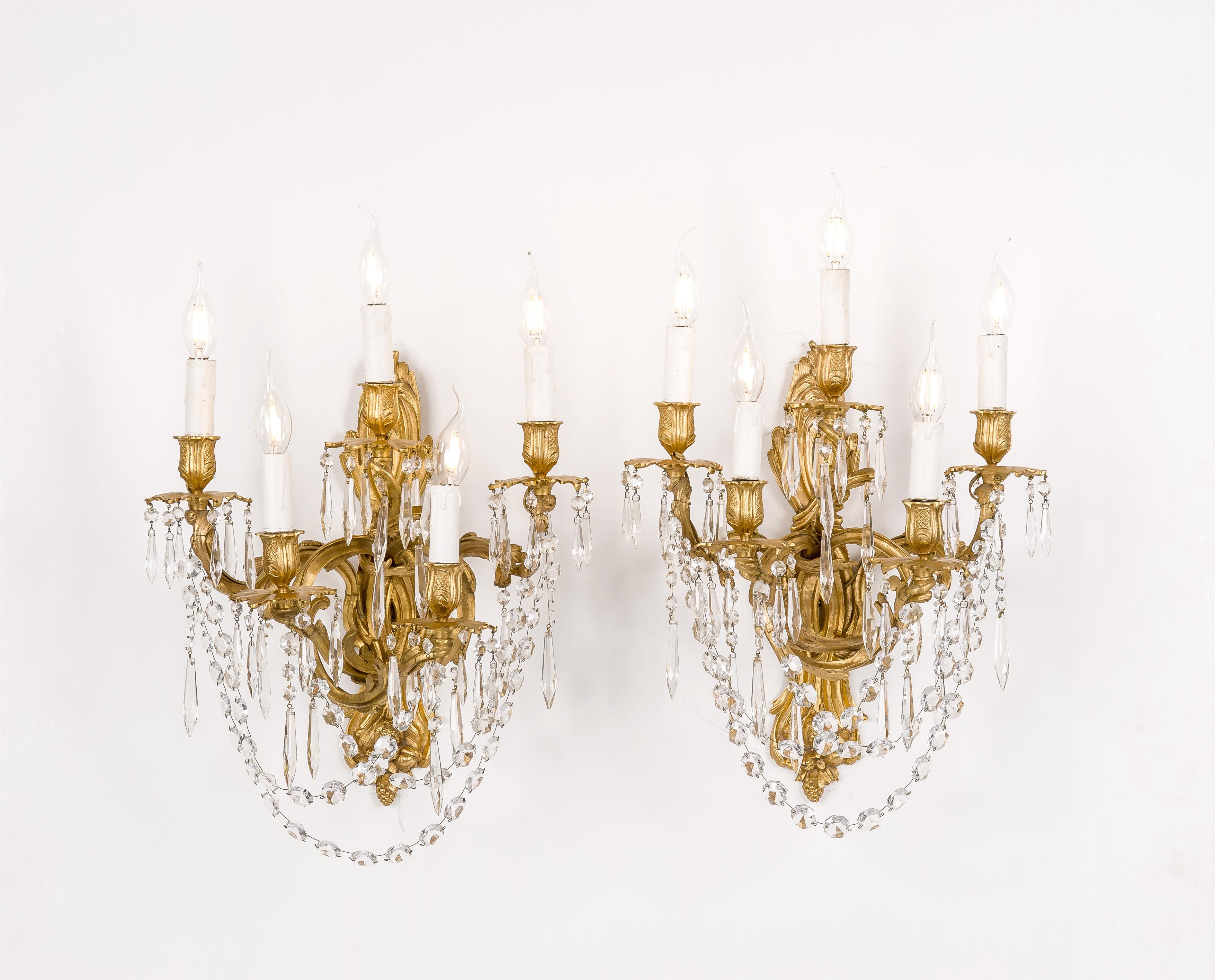 Rococo Antique pair of French fire gilt bronze and cut crystal  Louis XV sconces For Sale