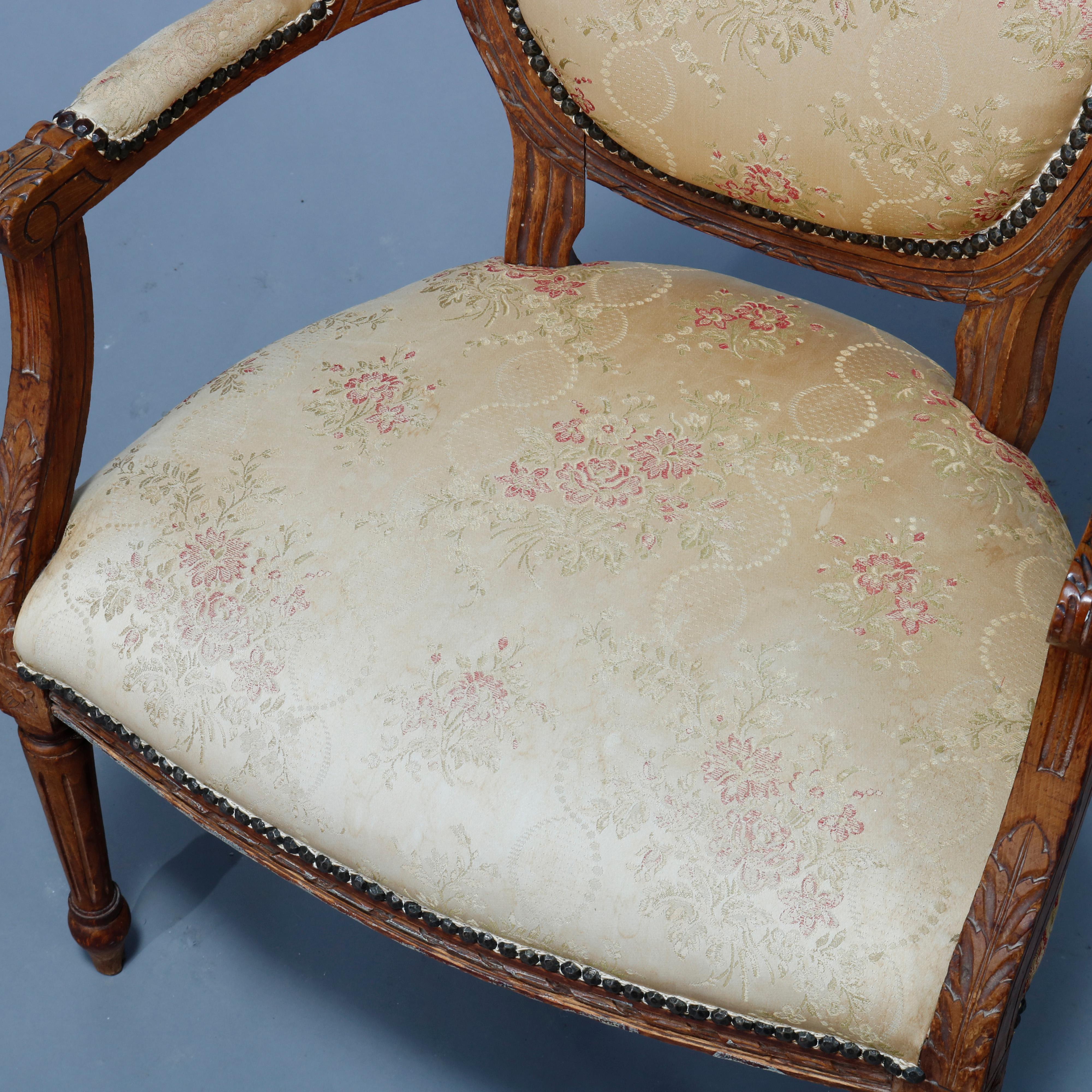 Carved Antique Pair of French Louis XVI Style Walnut Fauteuil Armchairs, 19th C For Sale