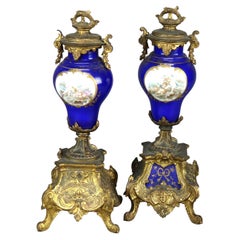 Antique Pair of French Neoclassical Gilt Metal
Porcelain Scenic Urns, c1890 Antique Pair of French Neoclassical Gilt Metal
Porcelain Scenic Urns, c1890