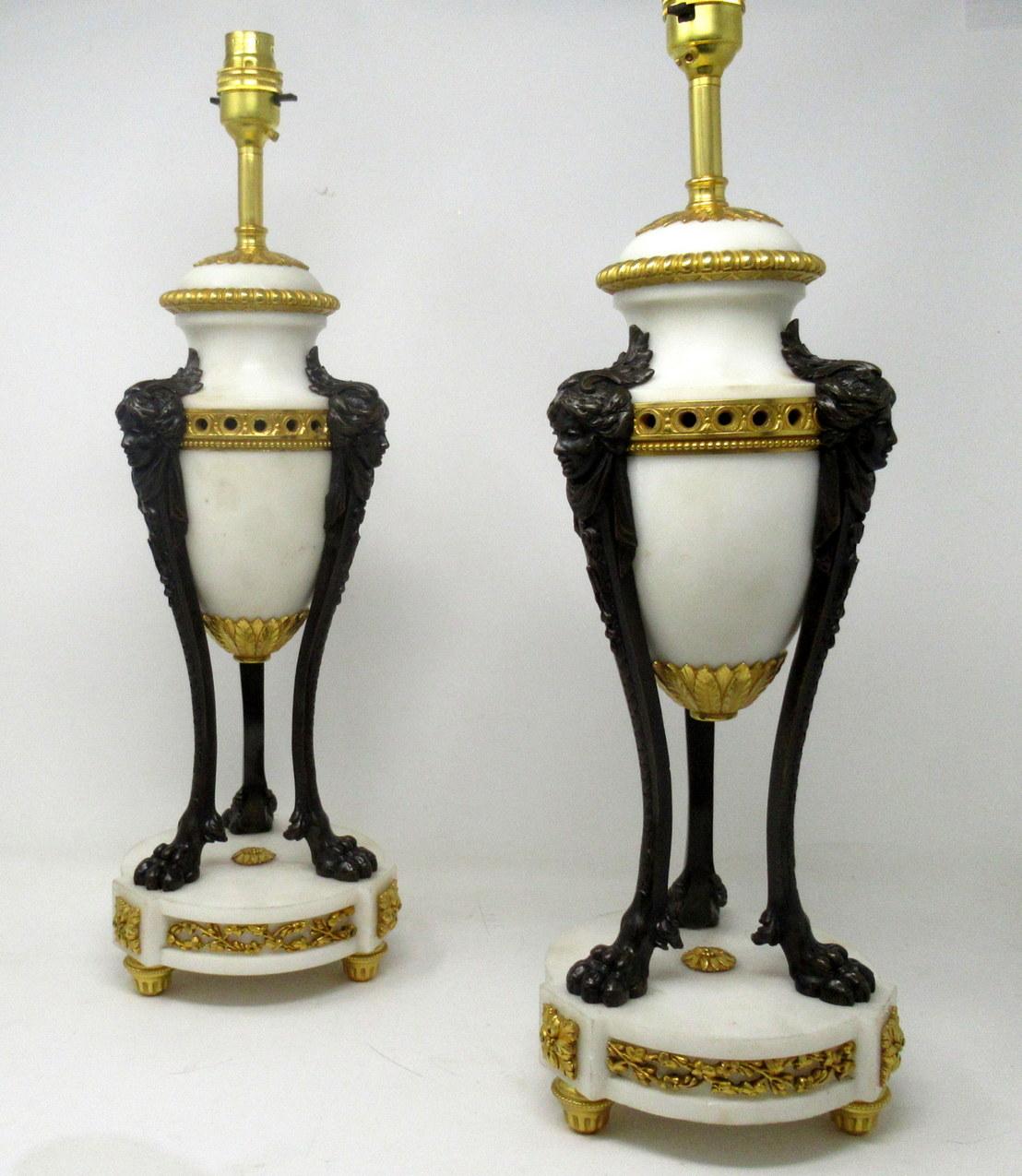 An exceptionally fine quality pair of French heavy gauge ormolu-mounted and bronze patinated statutory marble garniture urns in the Louis XV style, of large proportions, of French origin, now professionally converted to a pair electrical table