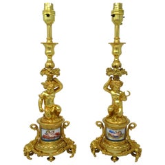 Antique Pair of French Sèvres Celeste Porcelain Gilt Bronze Cherub Table Lamps