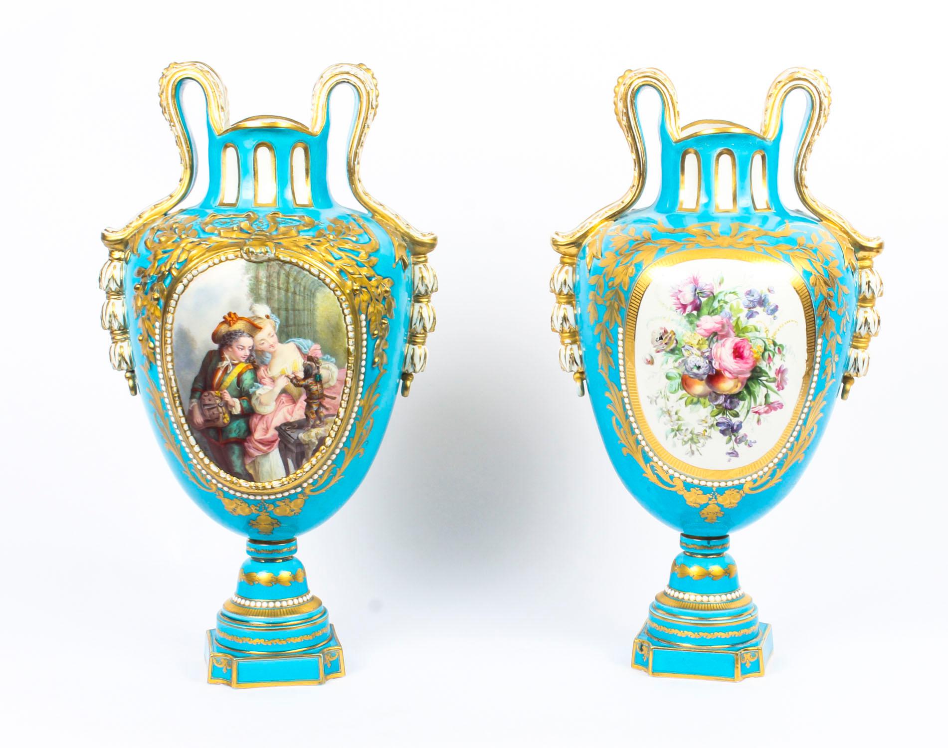 This fine and rare antique pair of French Sèvres porcelain vases bearing the Sèvres painted mark for 1765.

The decorative twin handle vases are superbly decorated with high-quality hand-painted panels of romantic domestic scenes of children playing