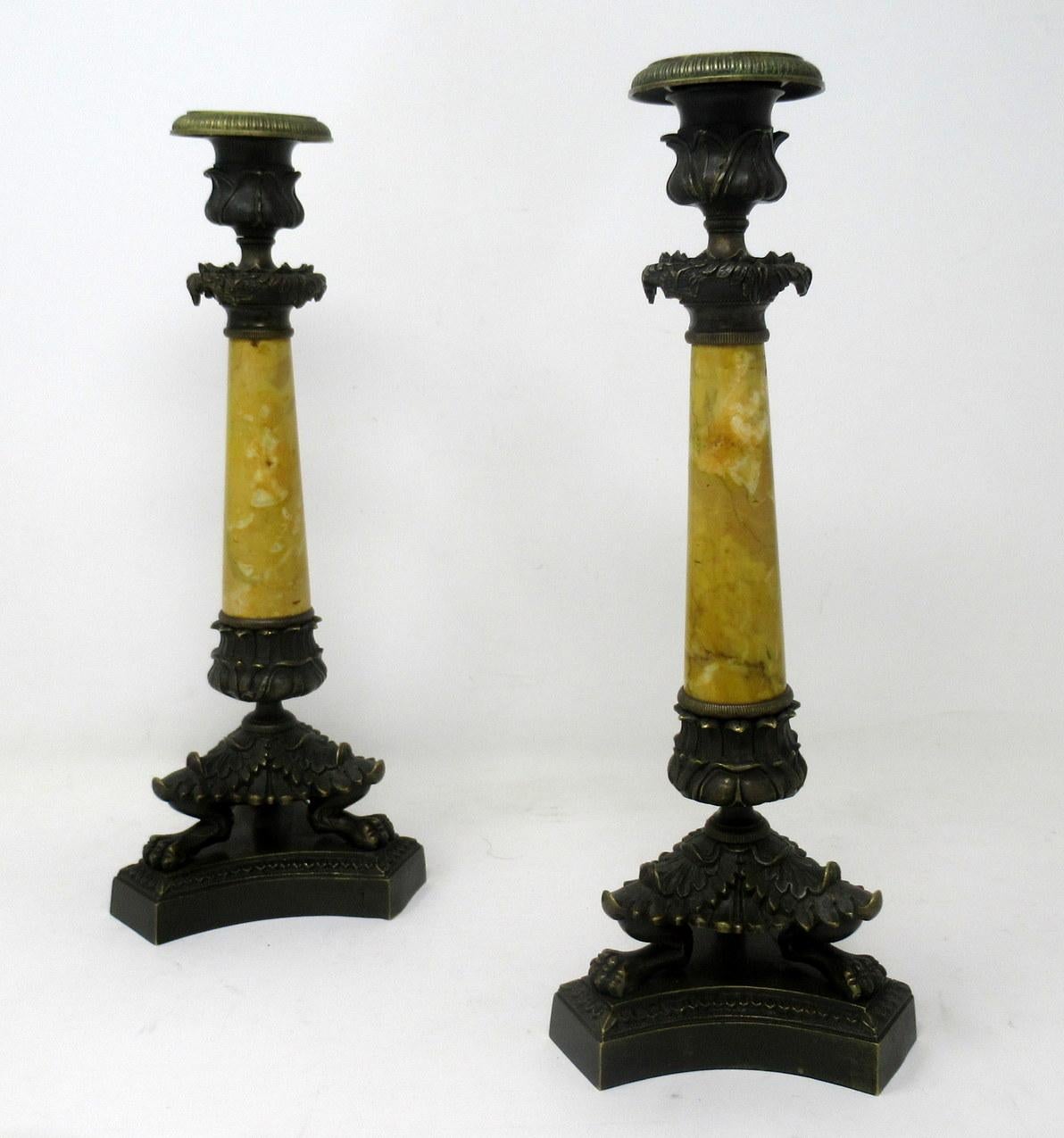 A very fine pair of French bronze and well grained sienna marble grand tour single light table or mantle candlesticks of medium size, outstanding workmanship quality with good heavy gauge chisel cast mounts throughout, first quarter of the 19th