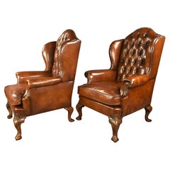 Antique pair of Georgian leather wing chairs 