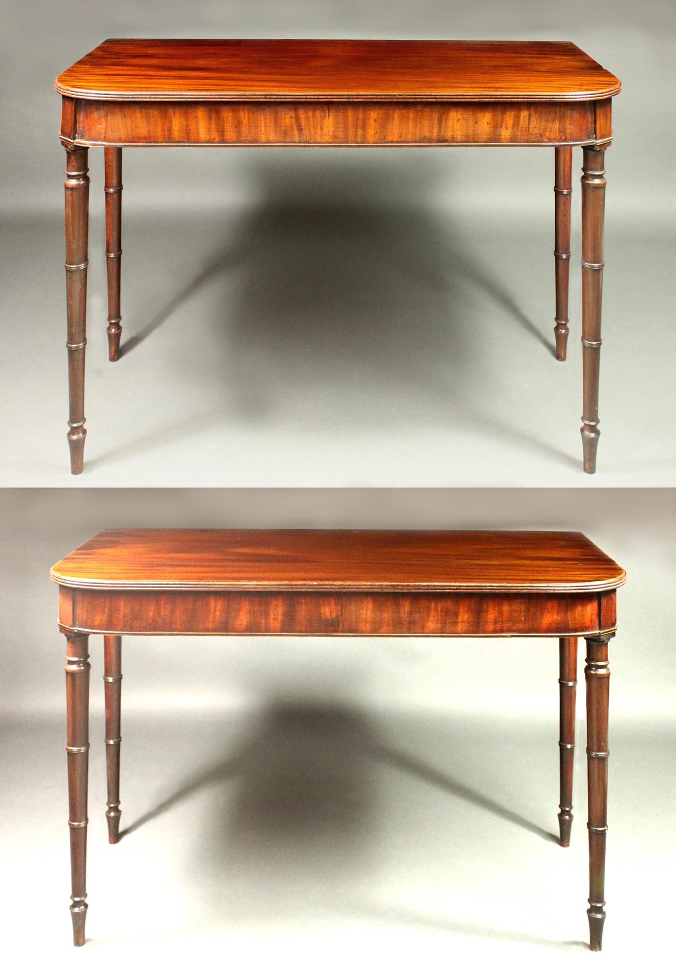 Antique Pair of Georgian Mahogany Serving Tables
A rare pair of George III serving tables in figured mahogany, elegant simulated bamboo turned legs and spade feet. The friezes vertically veneered in mahogany with the lower edges finished with