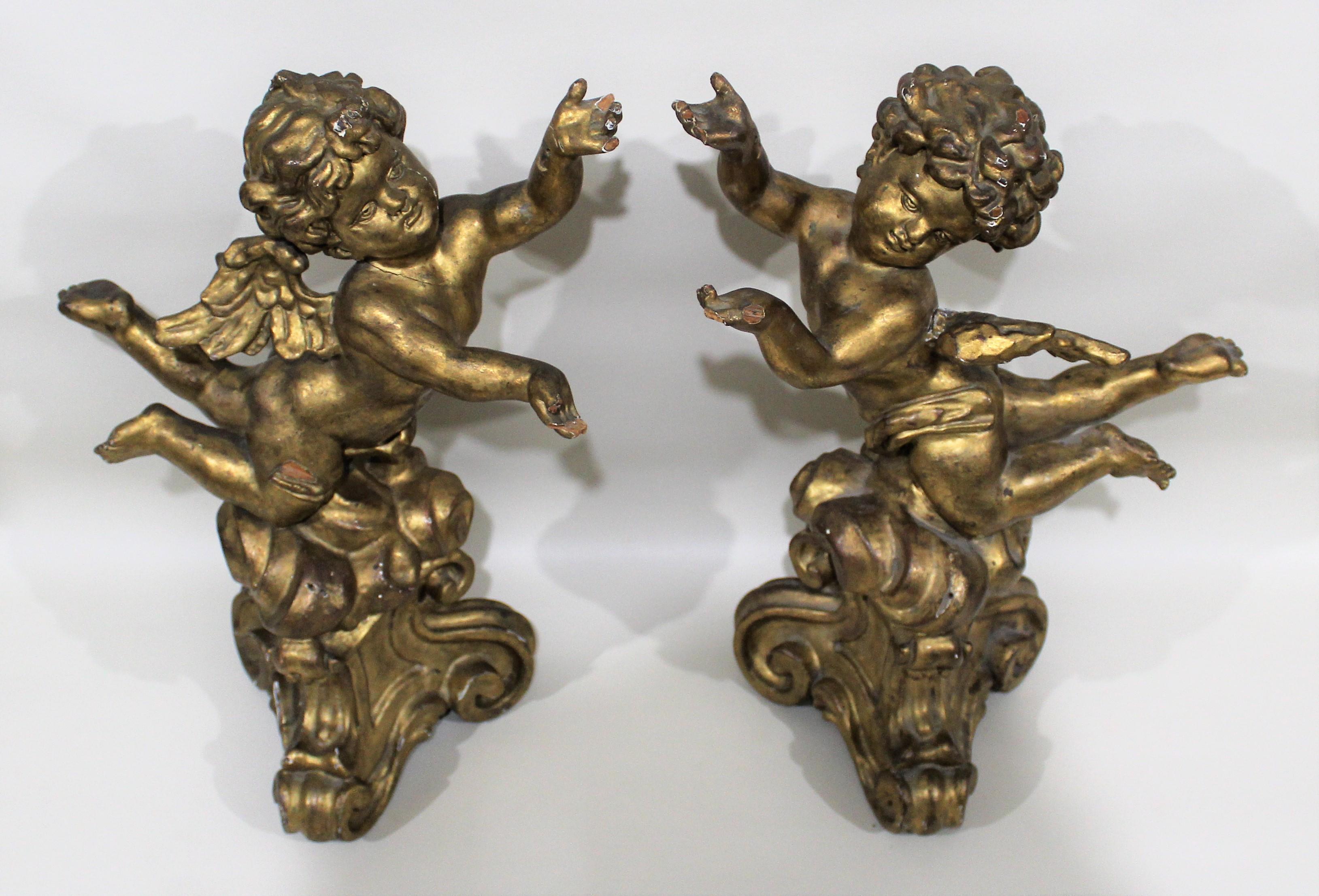 Antique Pair of Gilt Carved Wood Putti Figures In Distressed Condition In Hamilton, Ontario