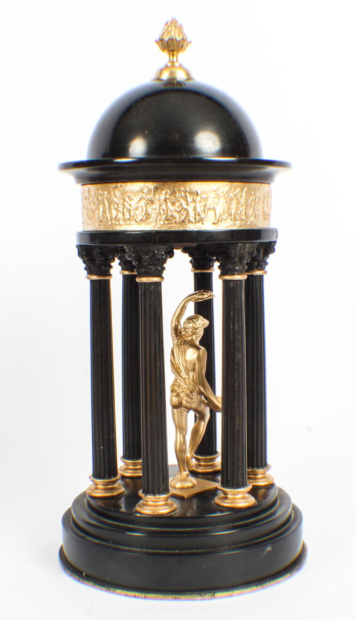 This is a truly stunning antique pair of Italian Grand Tour black marble and slate ormolu mounted colonnade temple models, dating from the mid-19th century.
 
This pair of colonnades feature domed topped roofs surmounted by ormolu flaming finials