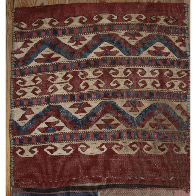 Antique pair of heybe (saddle bags) from Western Anatolia (Turkey). Probably from Balikesir in the Bergama Region.

The design and colours are outstanding. The bags have wonderful striped backs.

The bags are in excellent condition with signs of