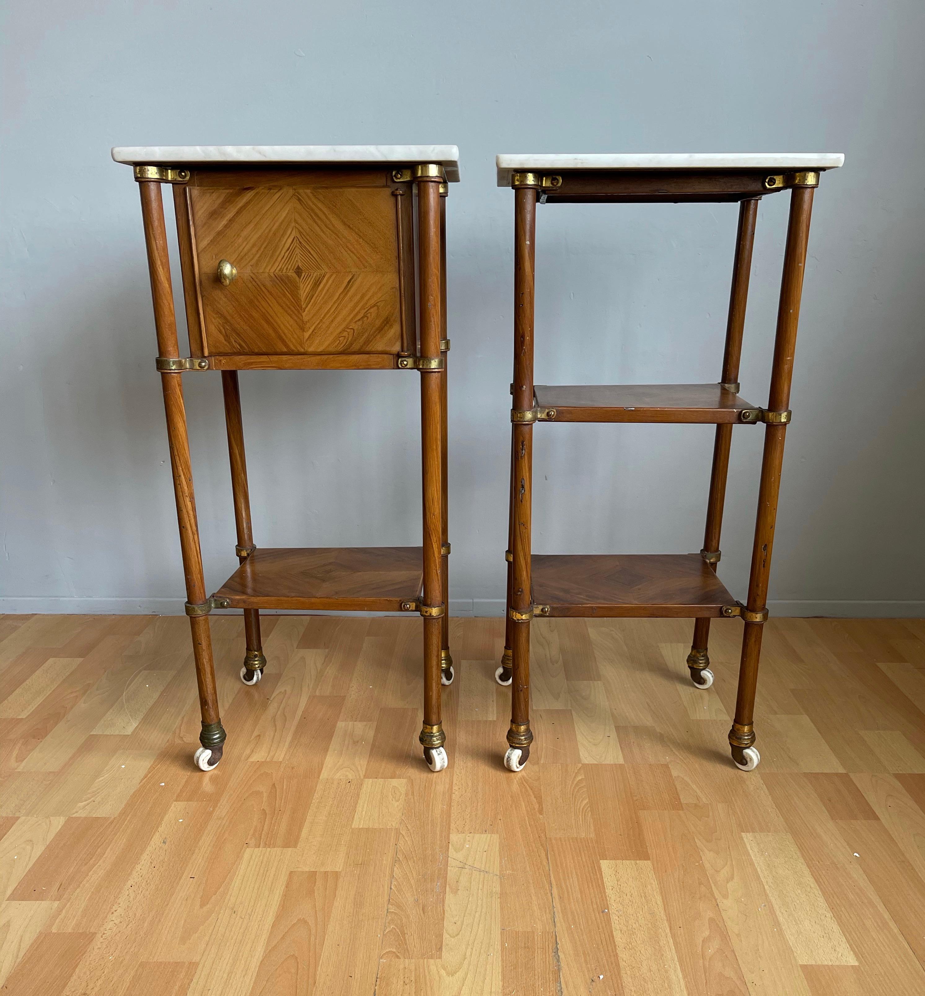 Incredibly stylish pair of metal bedside cabinets with marble tops and porcelain wheels.

When we first saw these remarkable bedside cabinets, we were only standing 5 feet away from them and we thought that they were actually made of wood. The hand