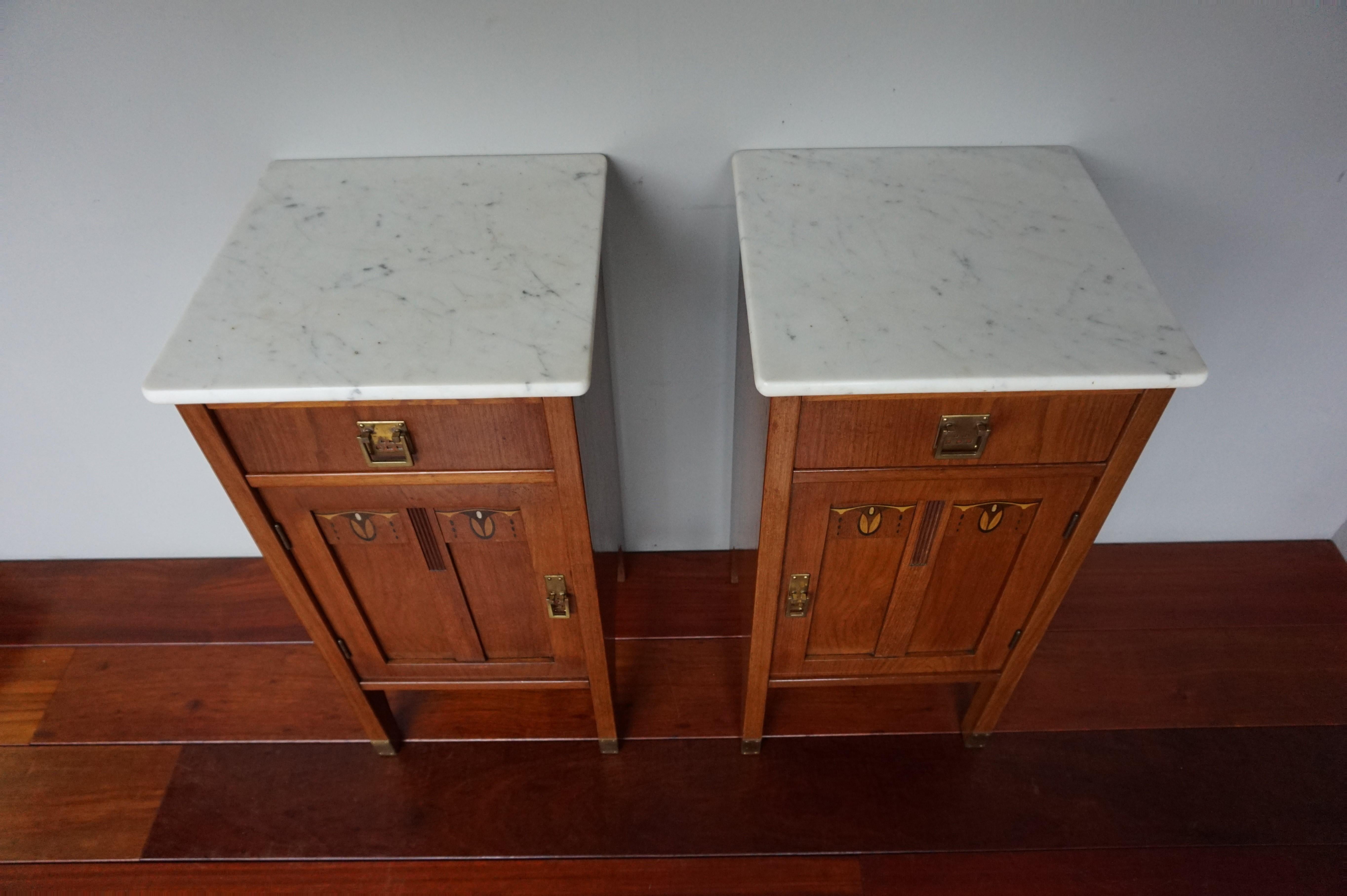 Beautiful style and very good condition pair of handcrafted nightstands.

If you are looking for aesthetically pleasing and practical to use bedside cabinets to grace your bedroom then this Arts & Crafts pair could be ideal. This early 20th century