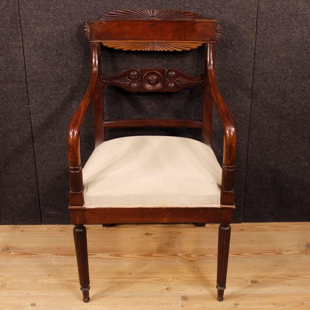 Pair of Genoese armchairs from the second half of the 19th century. Nicely carved furniture in mahogany wood of great quality. Seat upholstered in light fabric with some signs of wear, preferably to be replaced. Measures: Height to seat: 50 cm. An