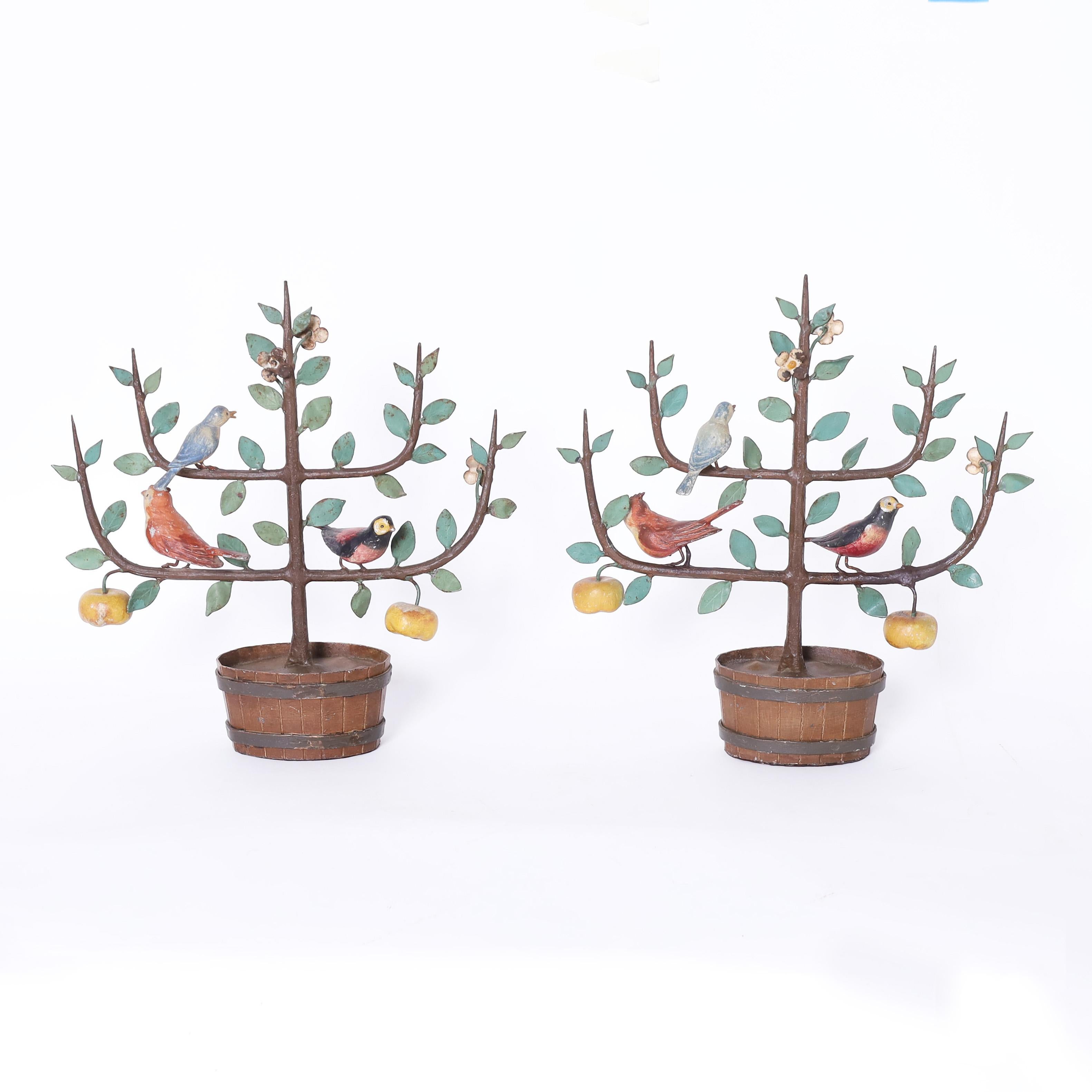 Charming pair of Italian tole plants or trees with fruit, flowers, and birds in a wood barrel planter now aged to perfection. 