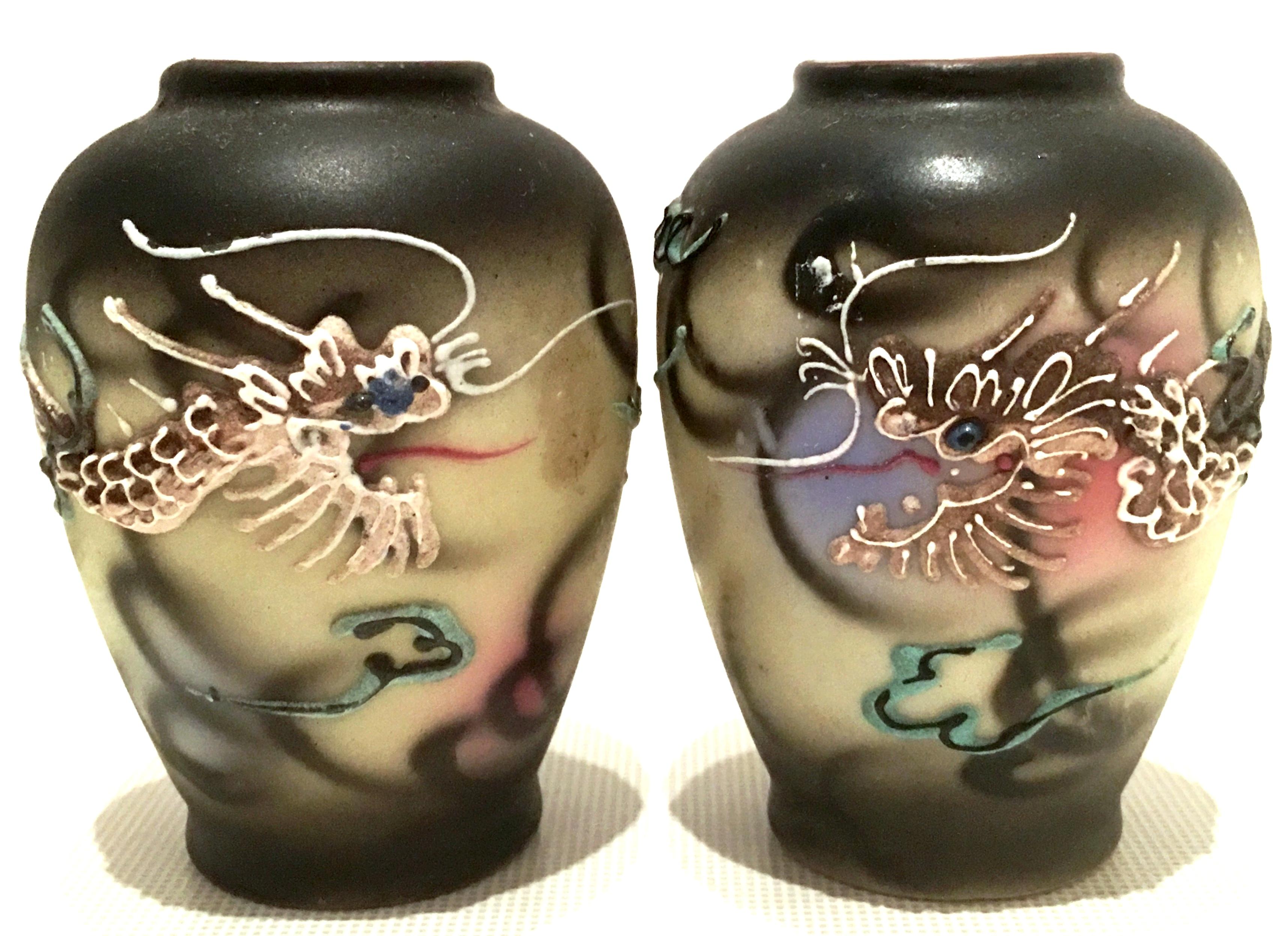 1920s pair of Japanese hand painted Moriage Dragon ware bud bases. Features a 