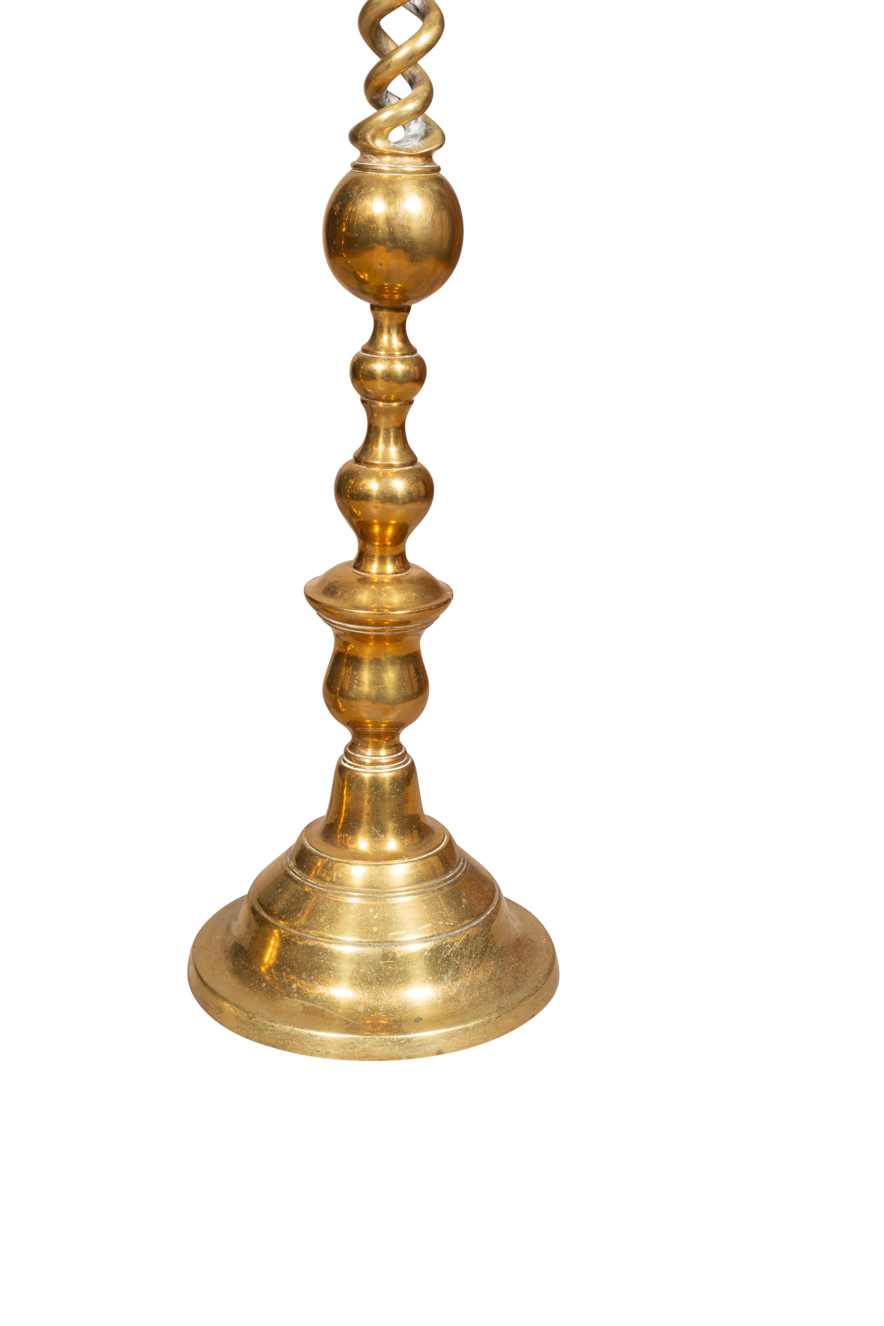 Can be used as floor candlesticks. Spiral twist with circular domed base. From the estate of the founder of Yankee Candle Company.