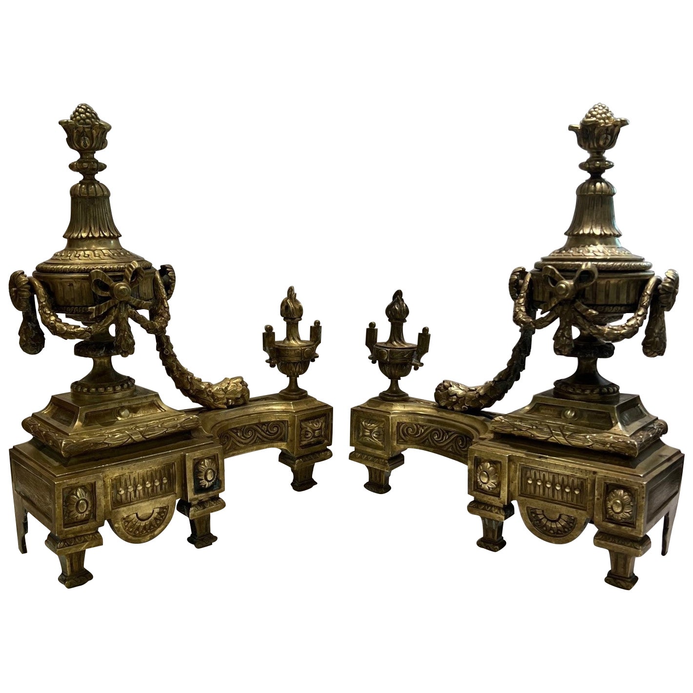 Antica coppia di Chenet in bronzo dorato in stile Luigi XVI